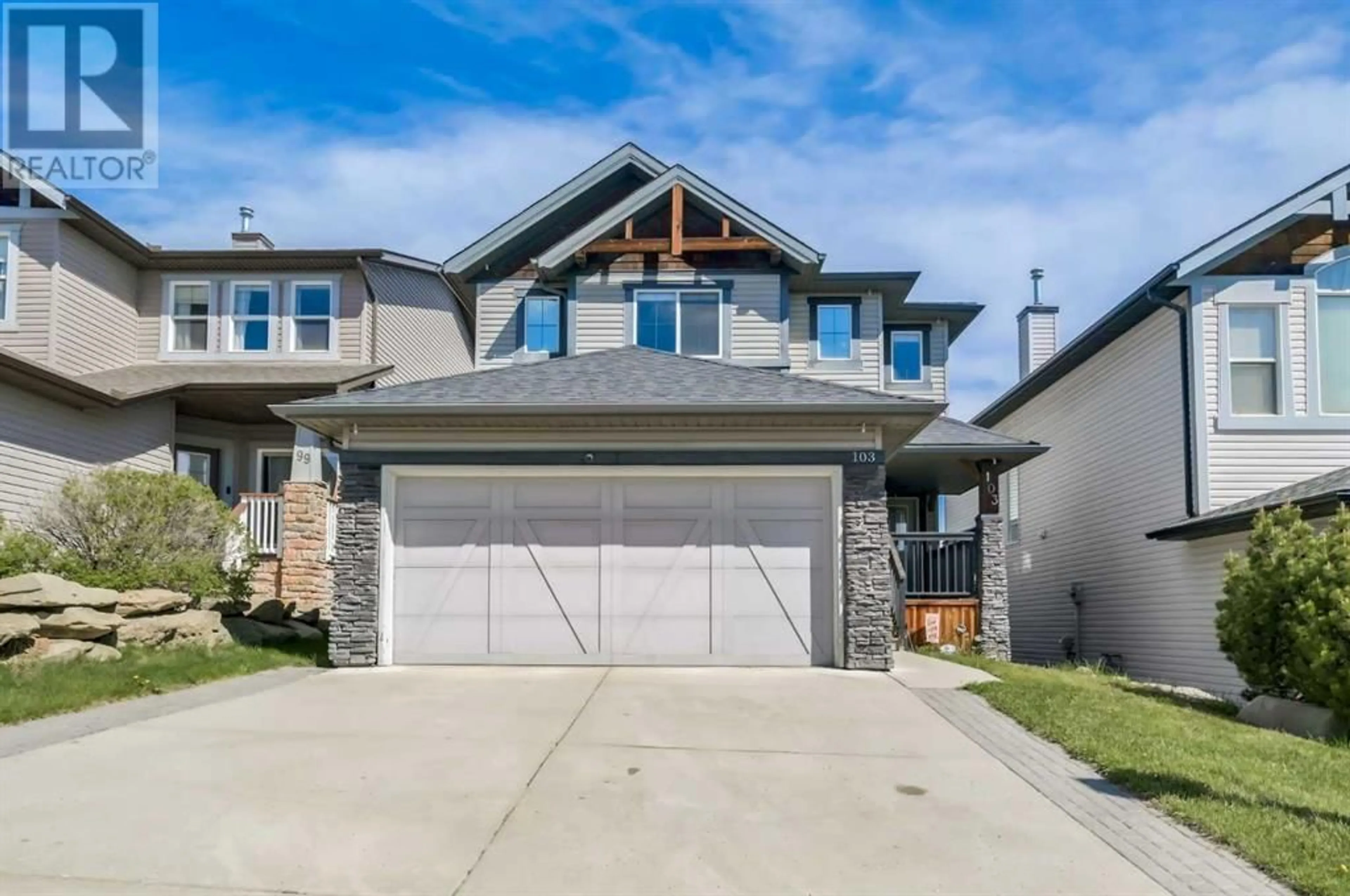 Frontside or backside of a home for 103 St Moritz Terrace SW, Calgary Alberta T3H5Y1