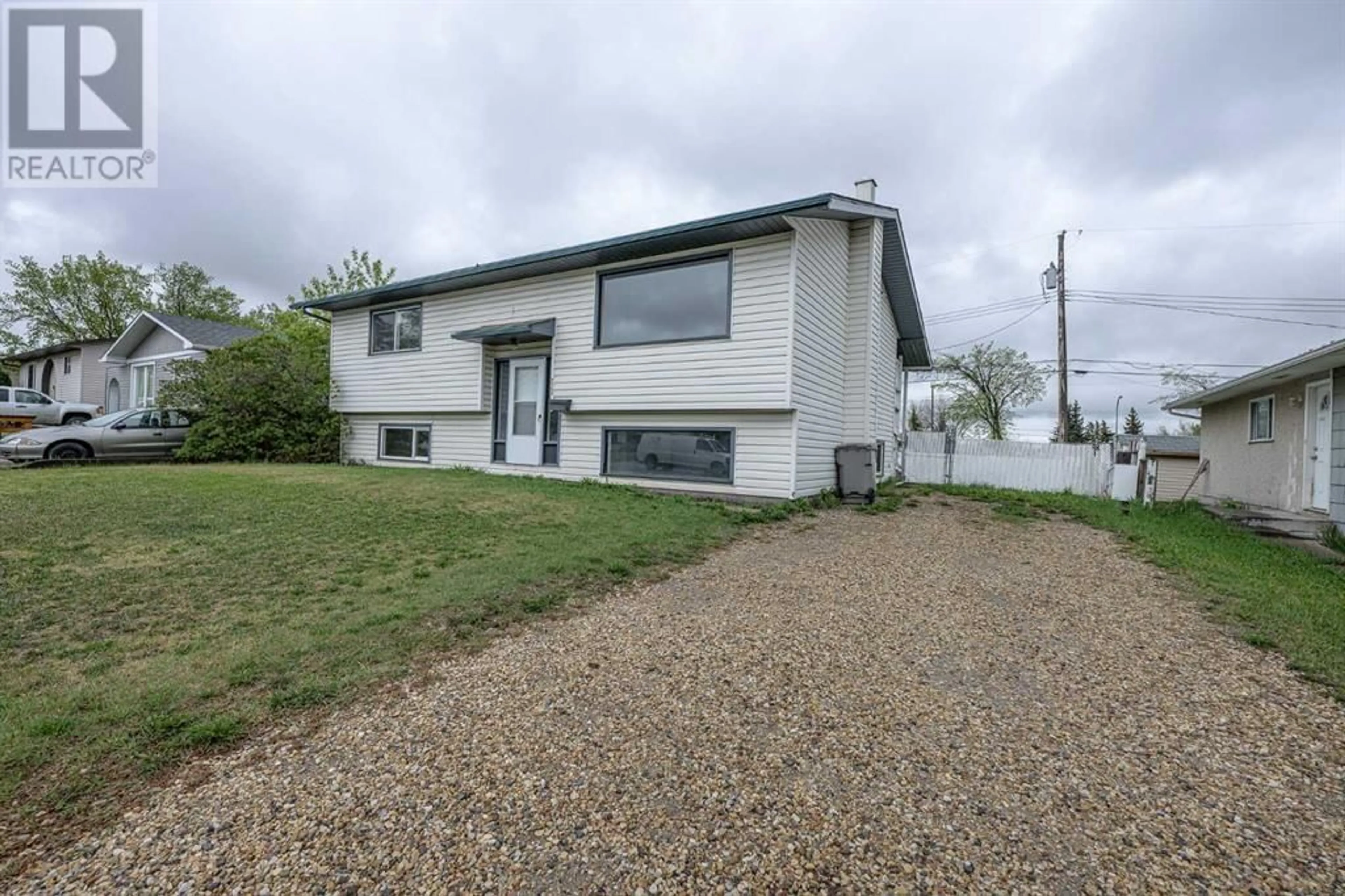 Frontside or backside of a home for 9737 117 Avenue, Grande Prairie Alberta T8V3P3