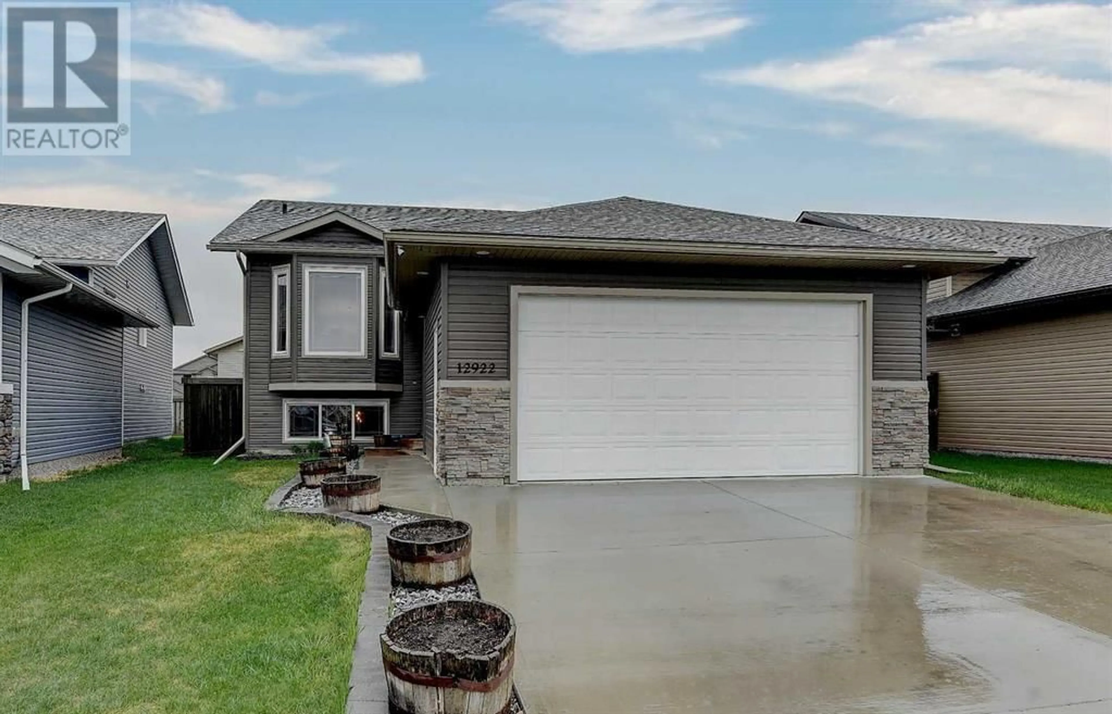 Frontside or backside of a home for 12922 105 Street, Grande Prairie Alberta T8V4K4