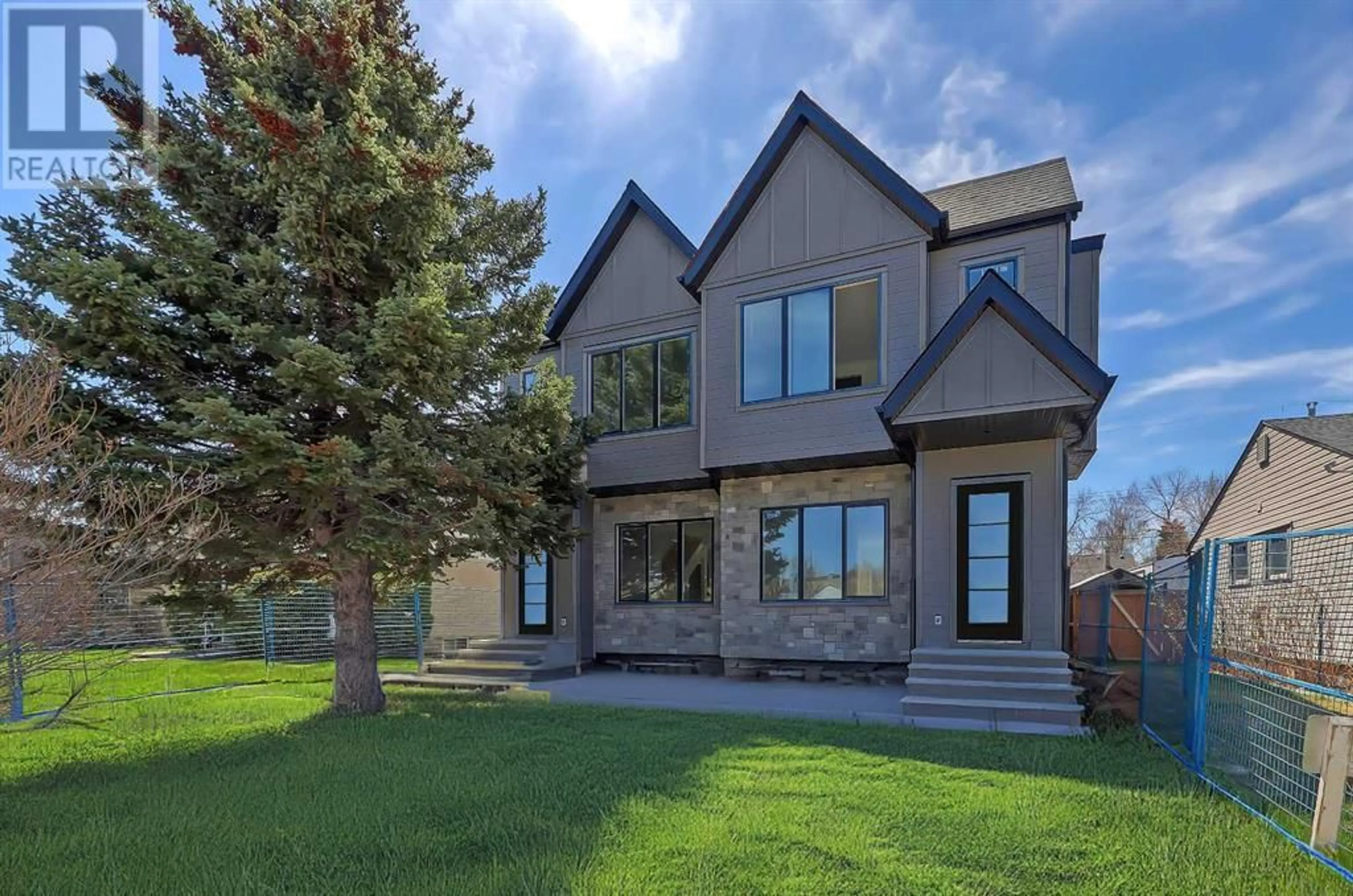 Frontside or backside of a home for 1033 Regal Crescent NE, Calgary Alberta T2E5G9