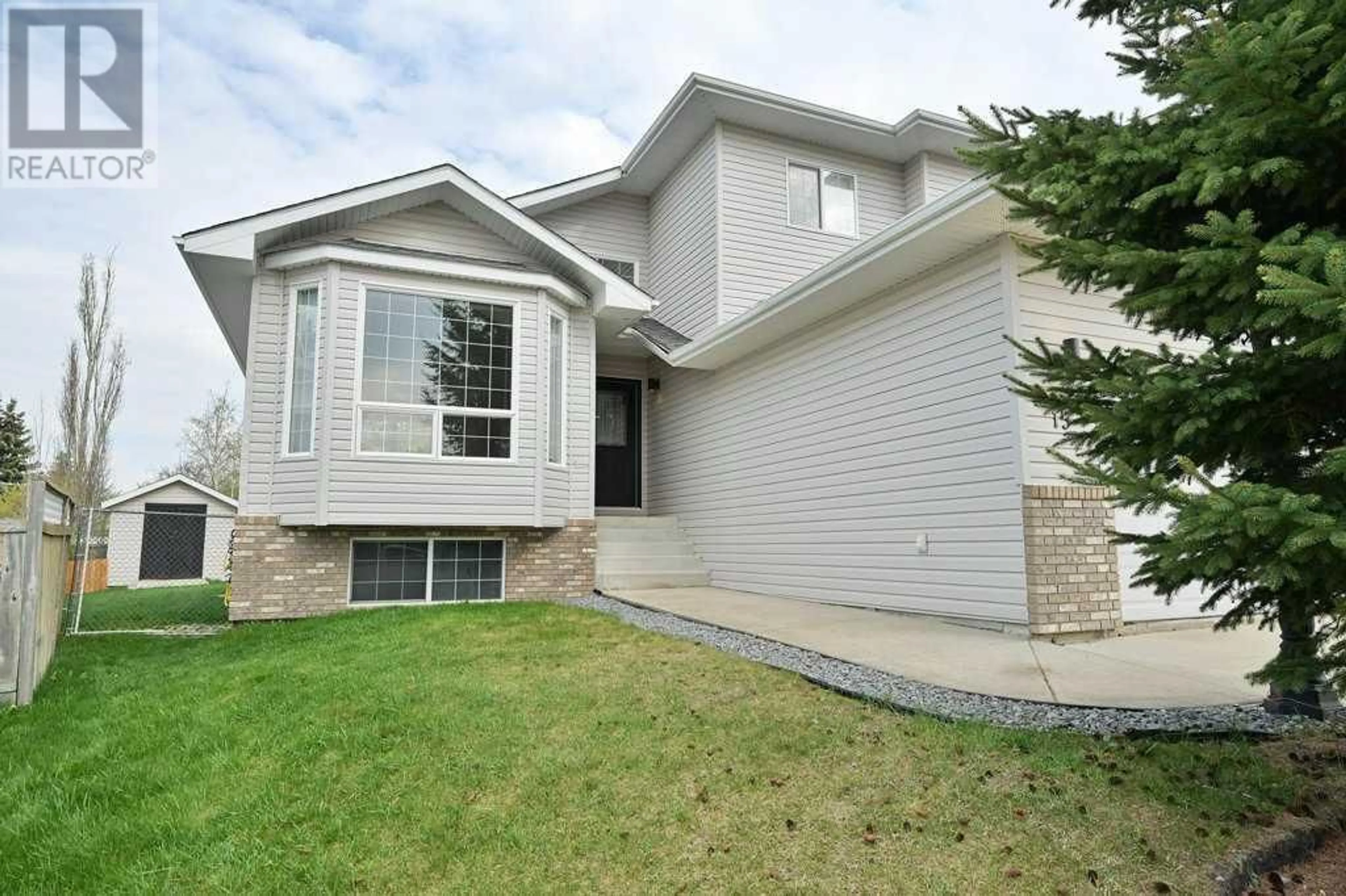 Frontside or backside of a home for 15 Pritchard Close, Sylvan Lake Alberta T4S1W3