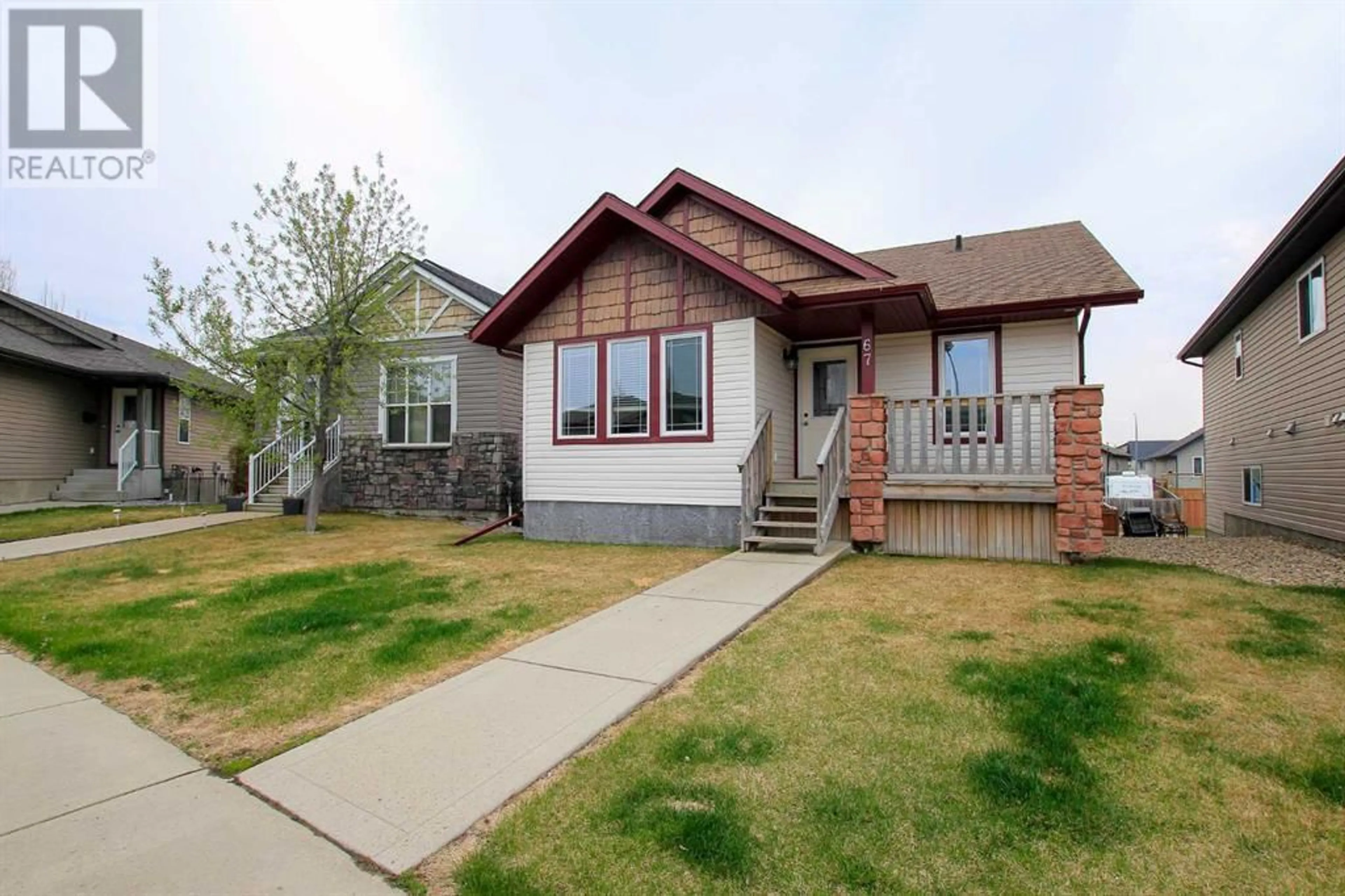 Frontside or backside of a home for 67 Imbeau Close, Red Deer Alberta T4R0C7