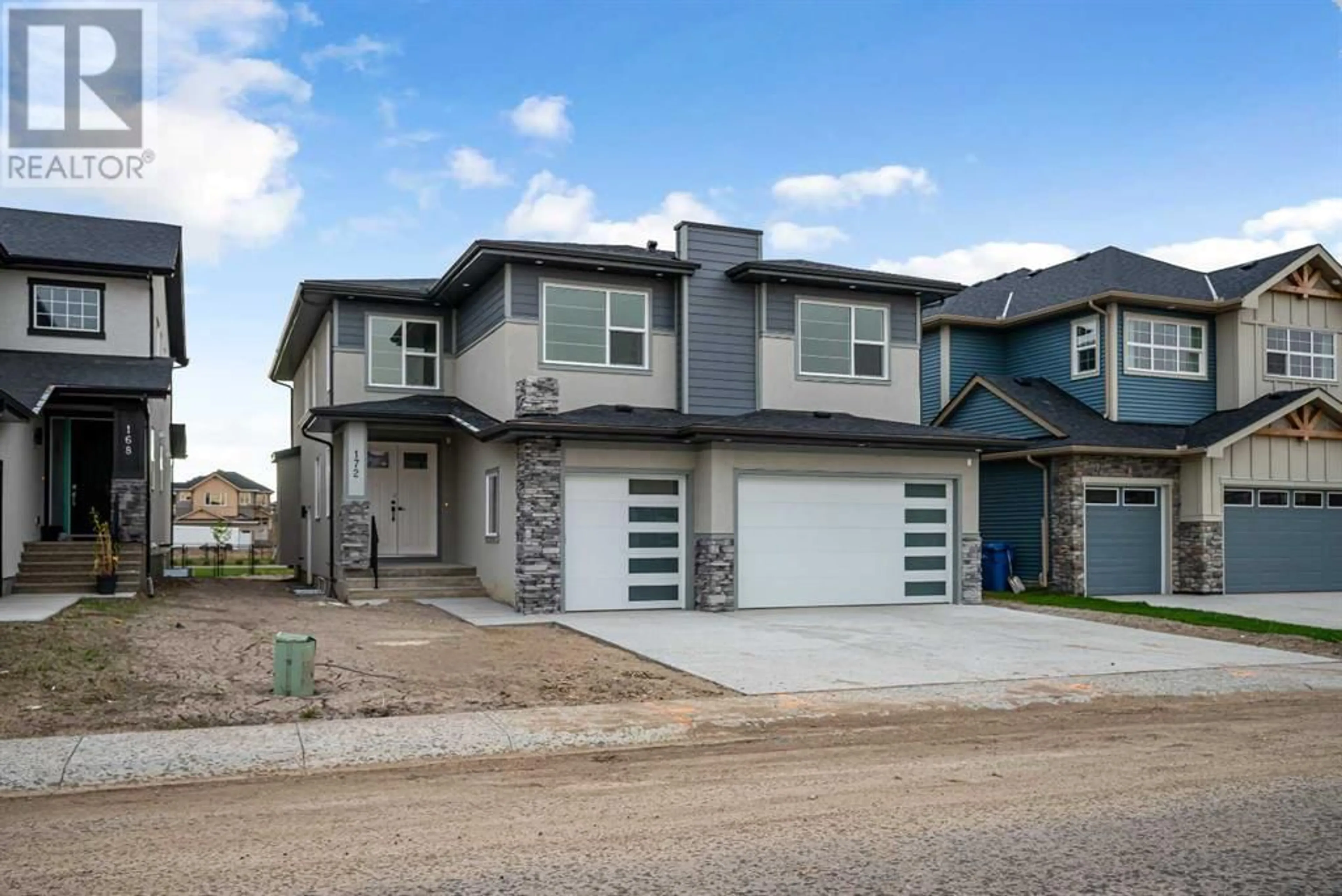 Frontside or backside of a home for 172 sandpiper Landing, Chestermere Alberta T1X1Y8
