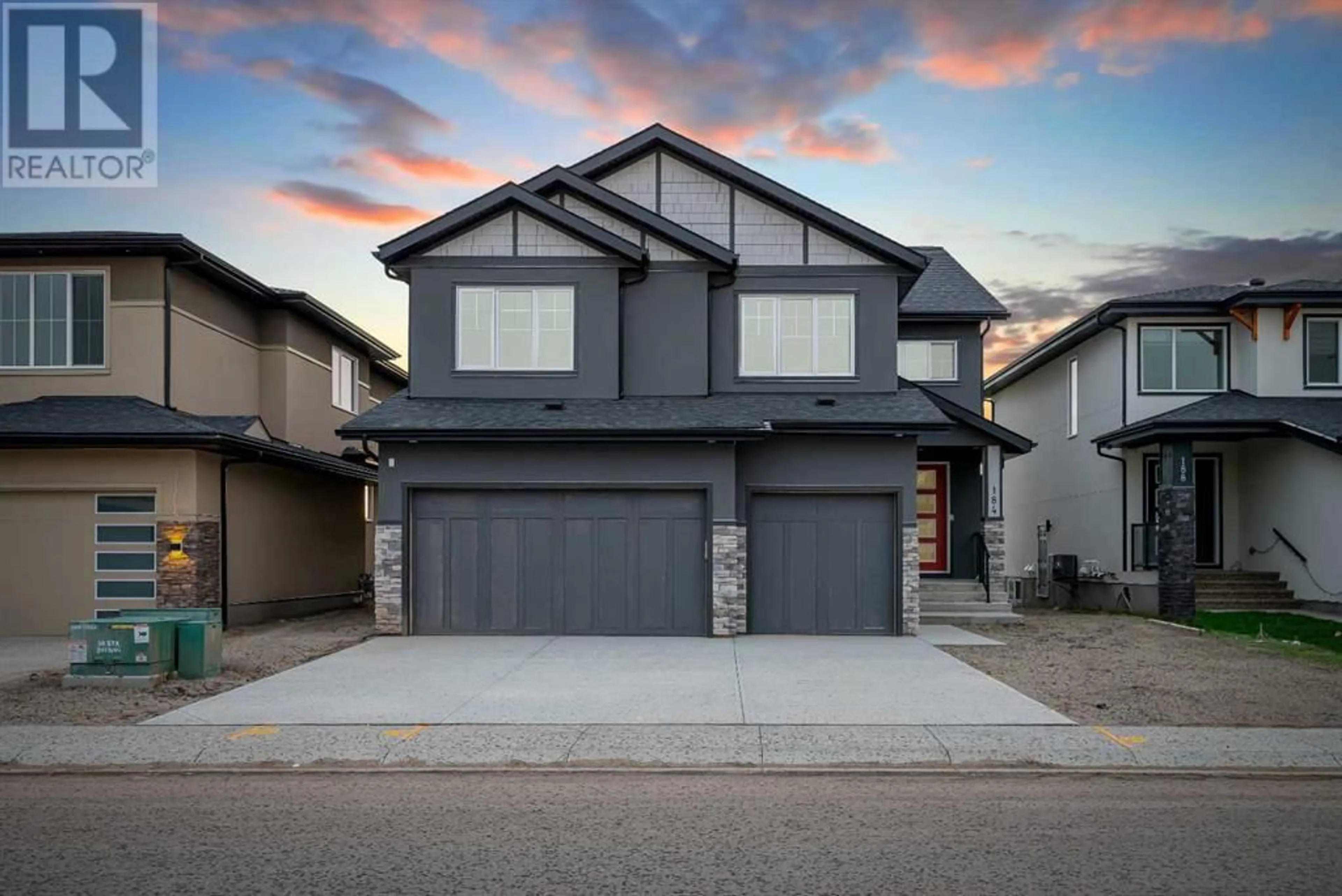 Frontside or backside of a home for 184 sandpiper Landing, Chestermere Alberta T1X1Y8