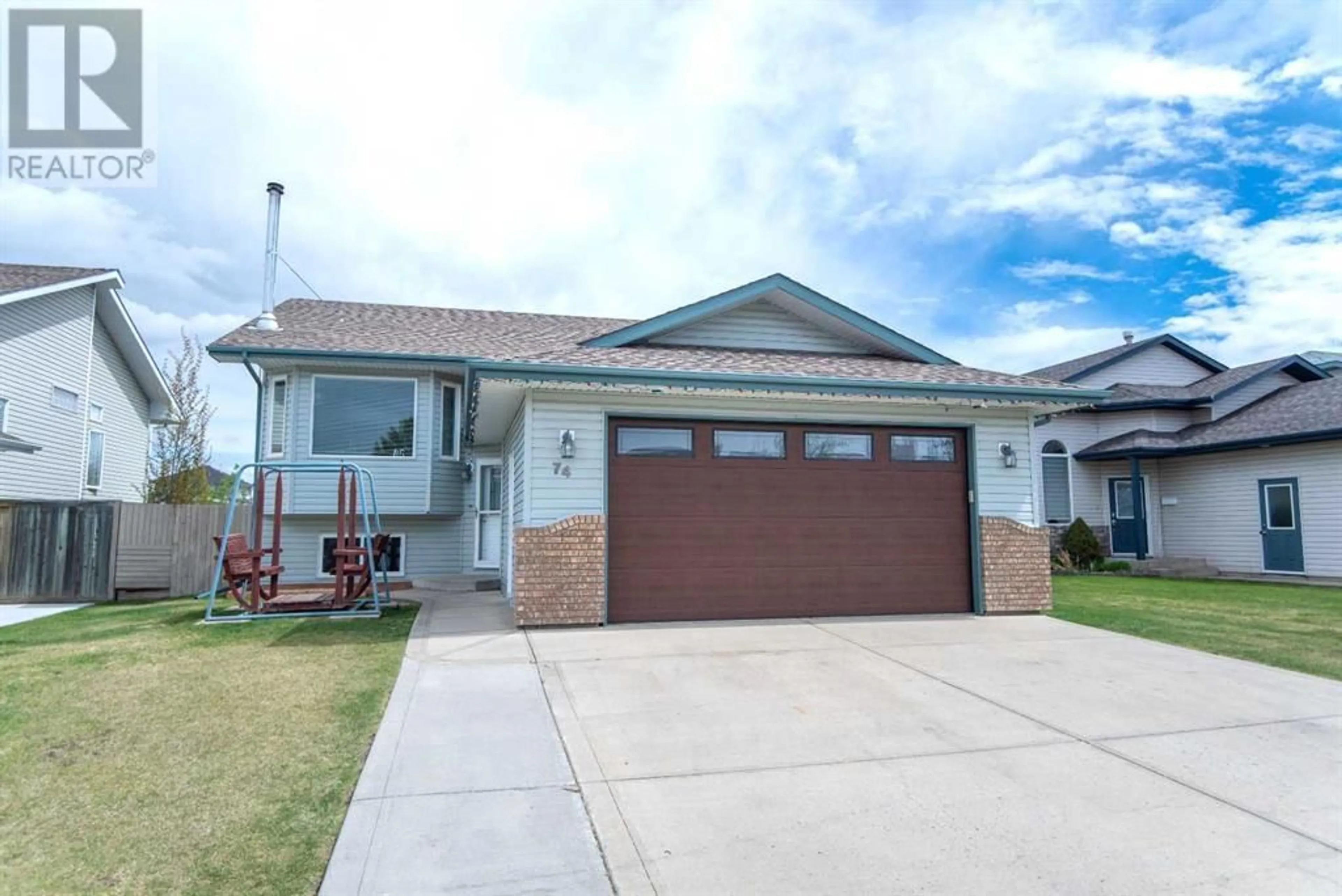 Frontside or backside of a home for 74 Duval Crescent, Red Deer Alberta T4R2Y6