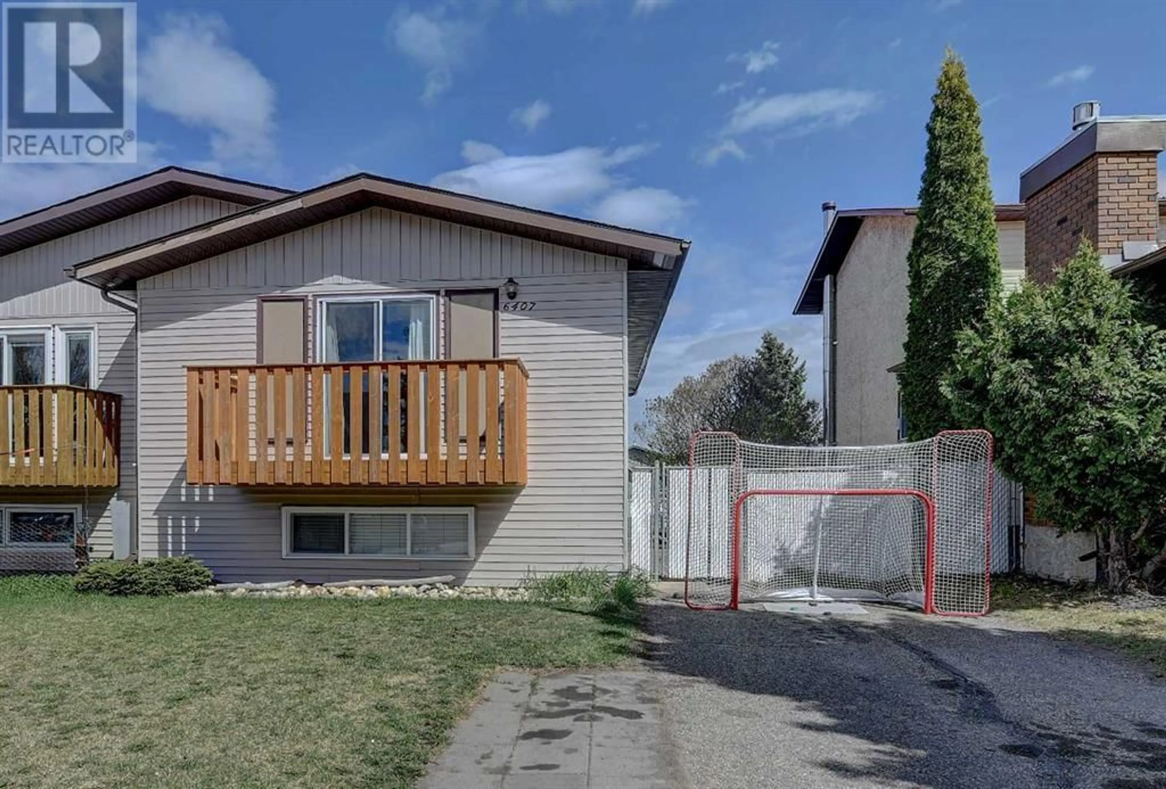 Frontside or backside of a home for 6407 94 Avenue, Grande Prairie Alberta T8W1B6