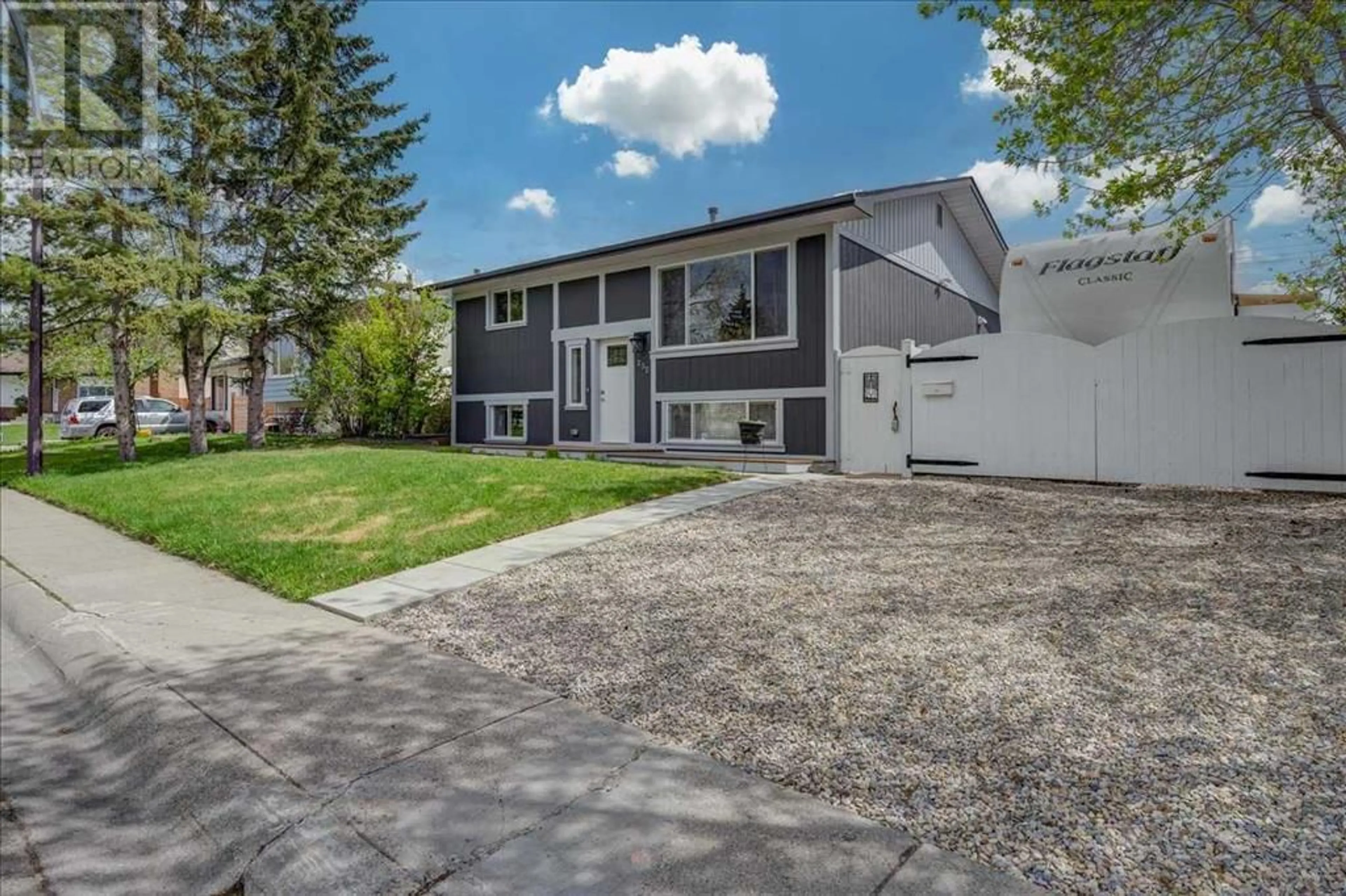A pic from exterior of the house or condo for 232 Manora Road NE, Calgary Alberta T2A4R6