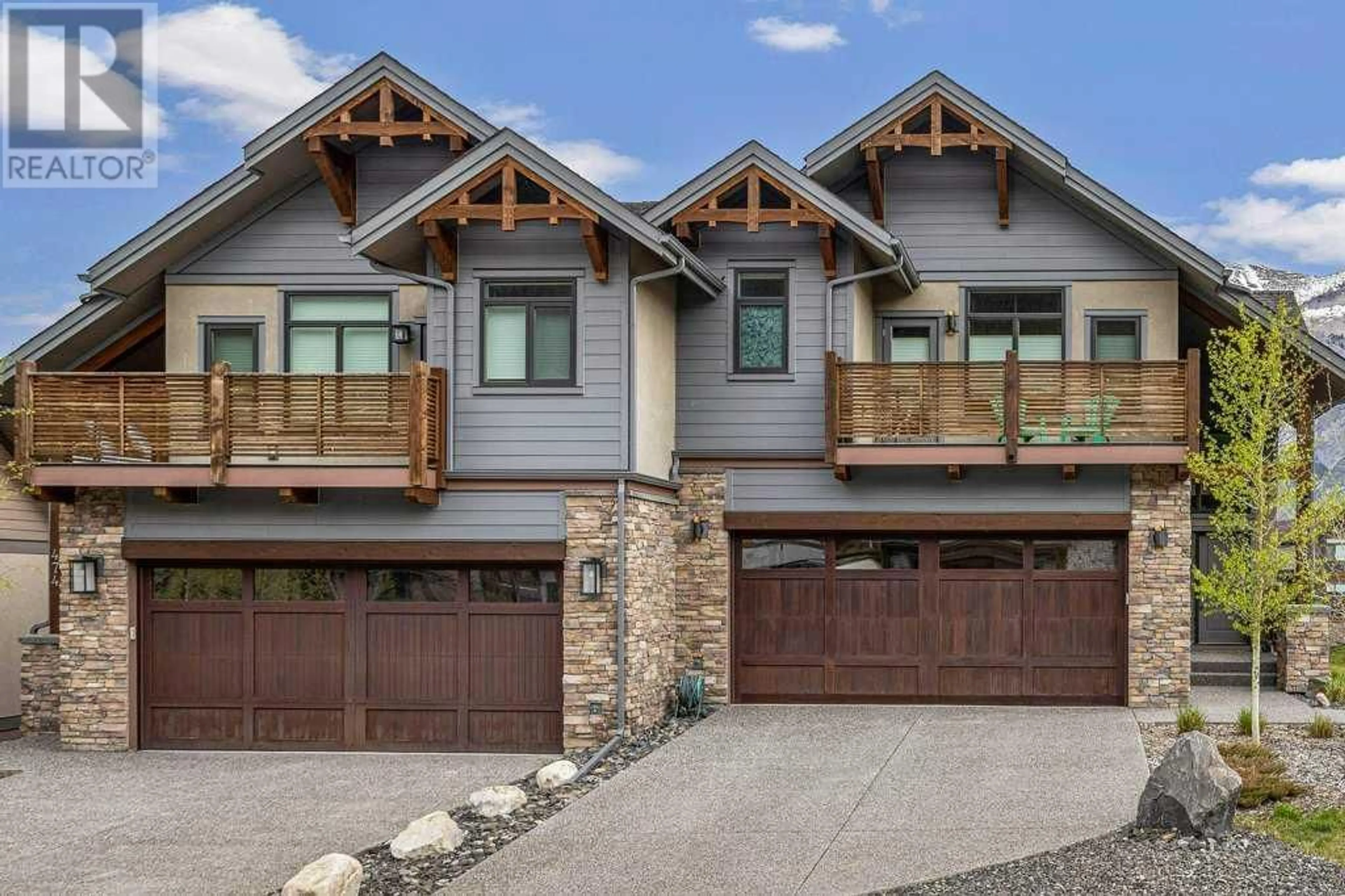Frontside or backside of a home for 478 Stewart Creek Close, Canmore Alberta T1W0J5