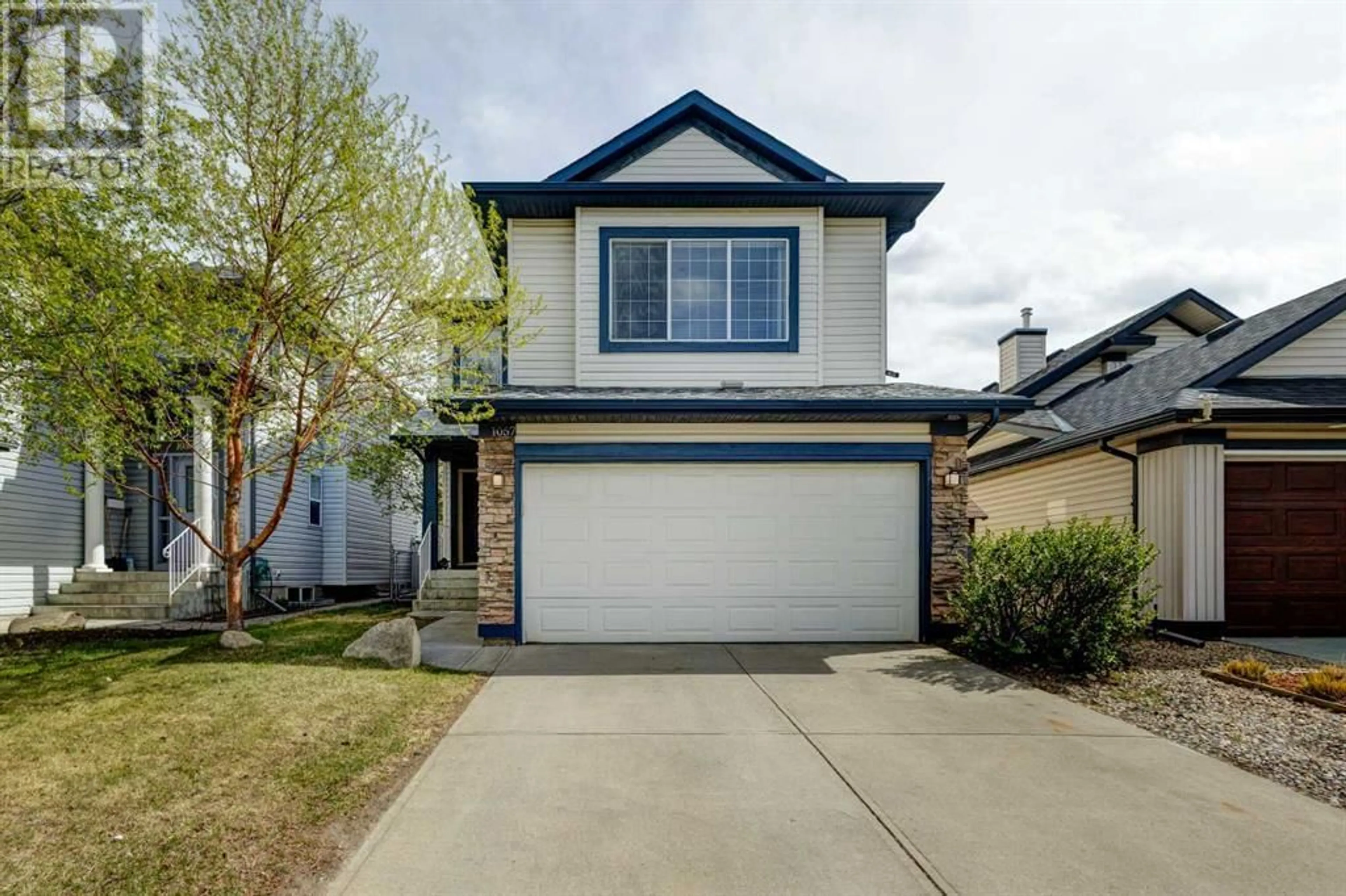 Frontside or backside of a home for 1057 Cranston Drive SE, Calgary Alberta T3M1A5