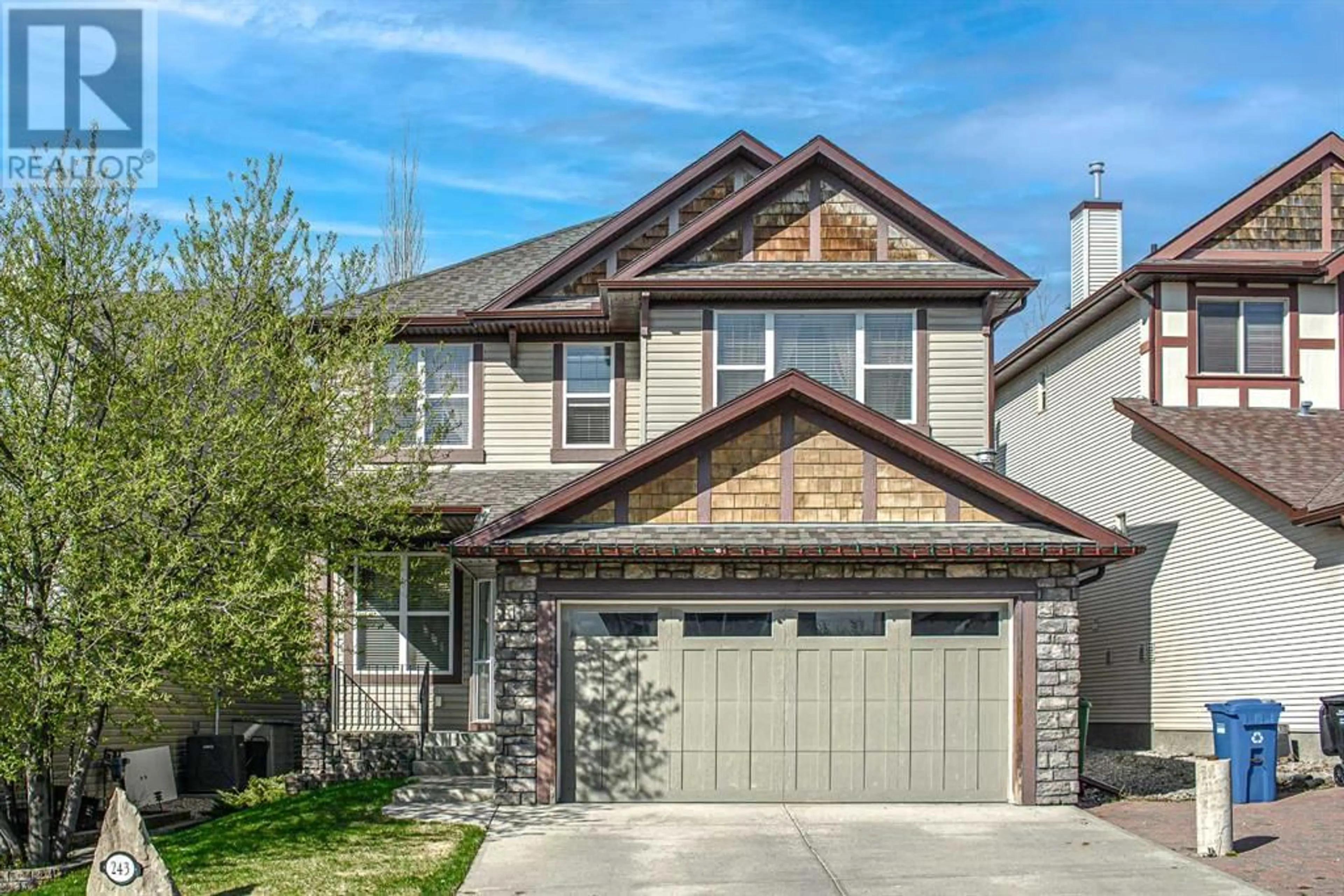 Frontside or backside of a home for 243 St Moritz Drive SW, Calgary Alberta T3H5Y2