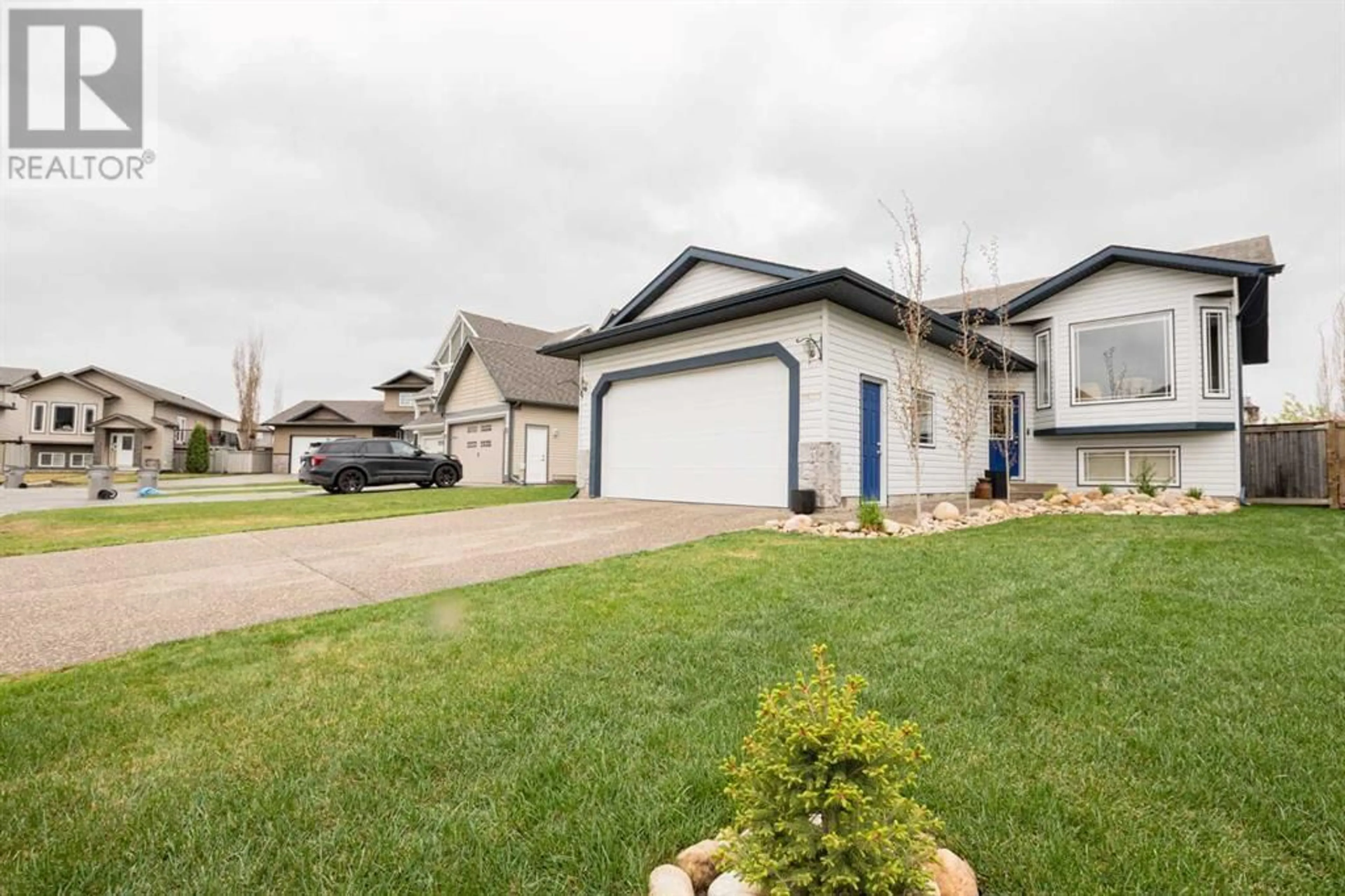 Frontside or backside of a home for 7630 114 Street, Grande Prairie Alberta T8W2T7