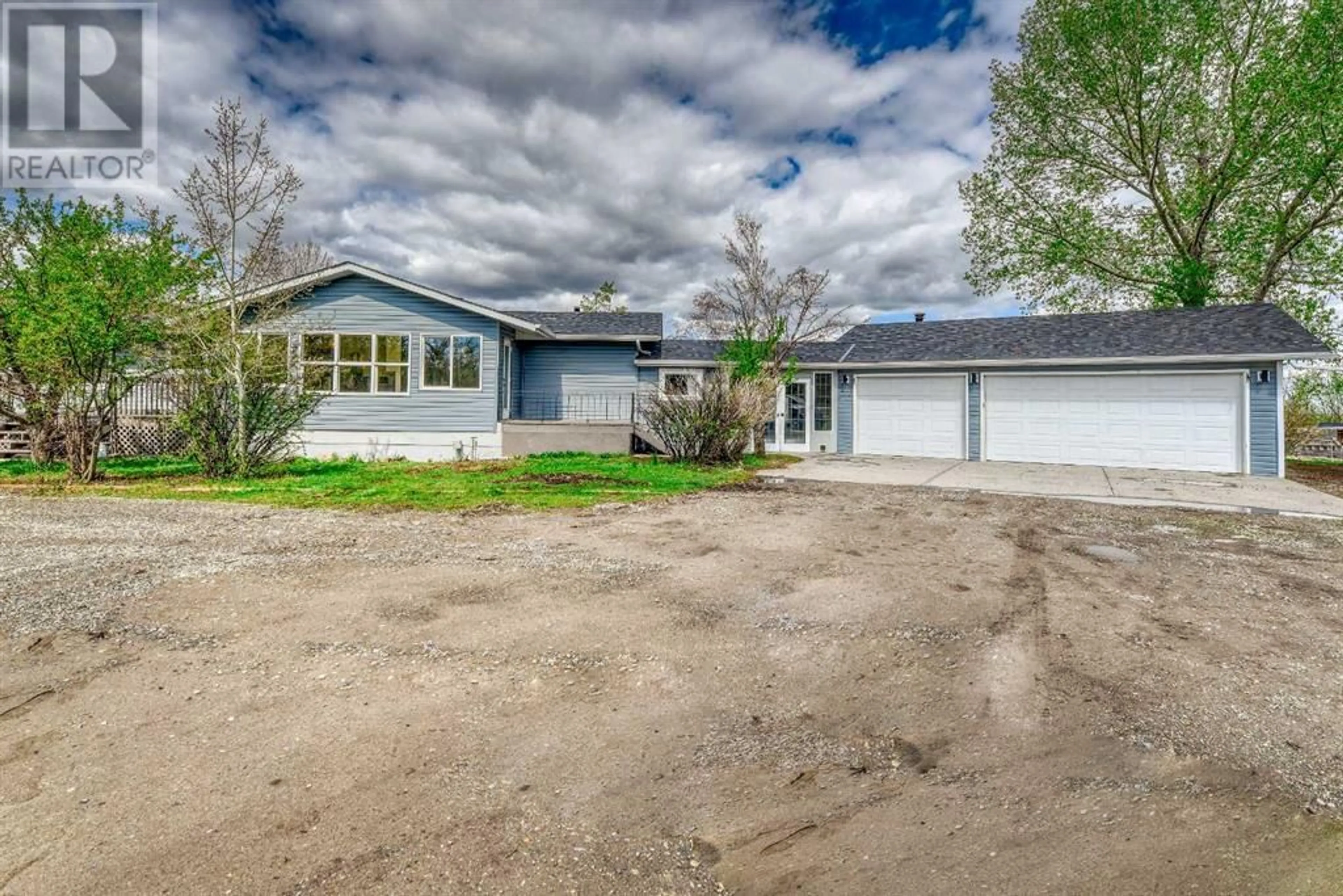 Frontside or backside of a home for 243089 16 Street E, Rural Foothills County Alberta T0Y0Y0