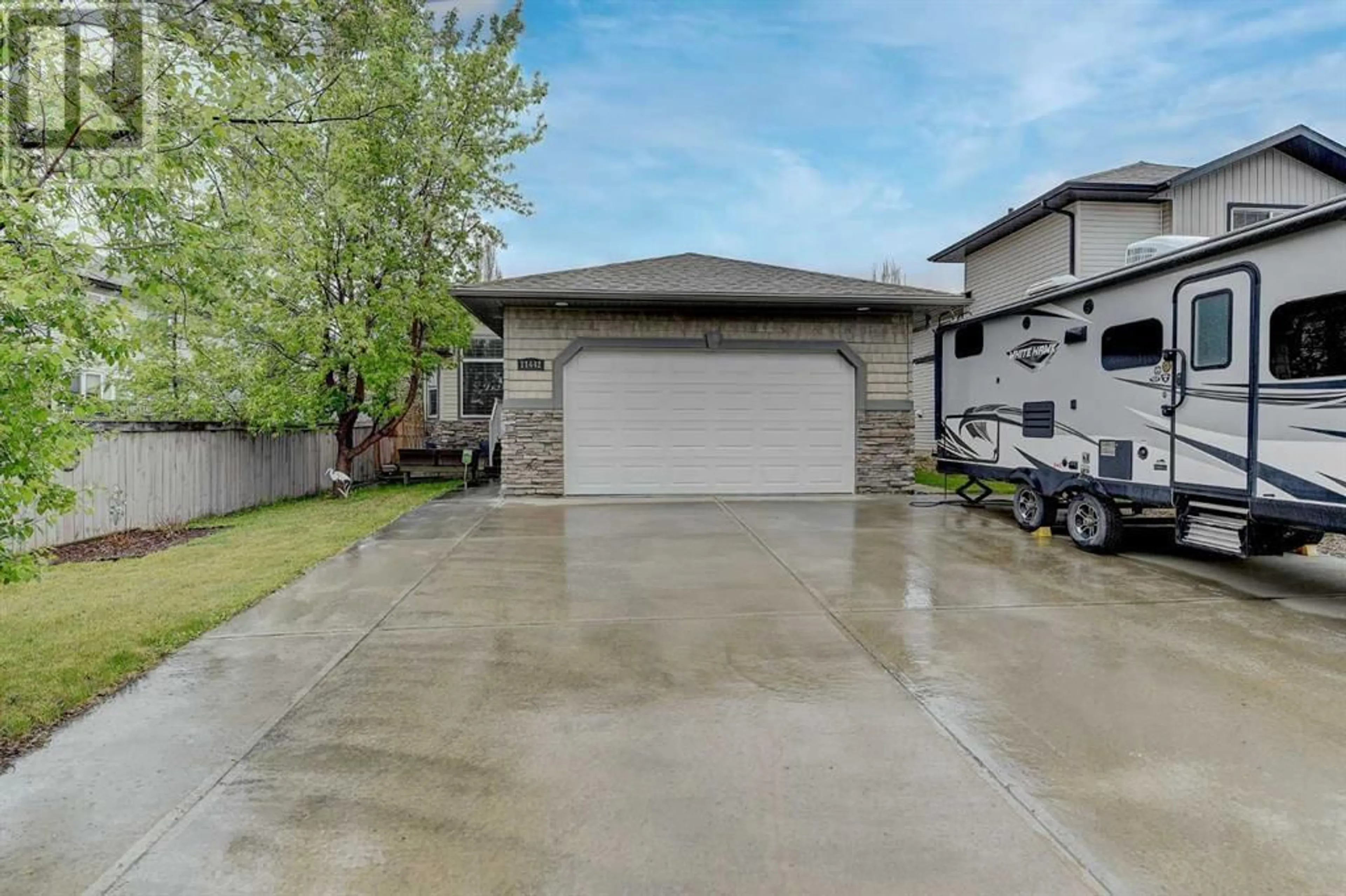 Frontside or backside of a home for 11442 Pinnacle Drive, Grande Prairie Alberta T8W0E6