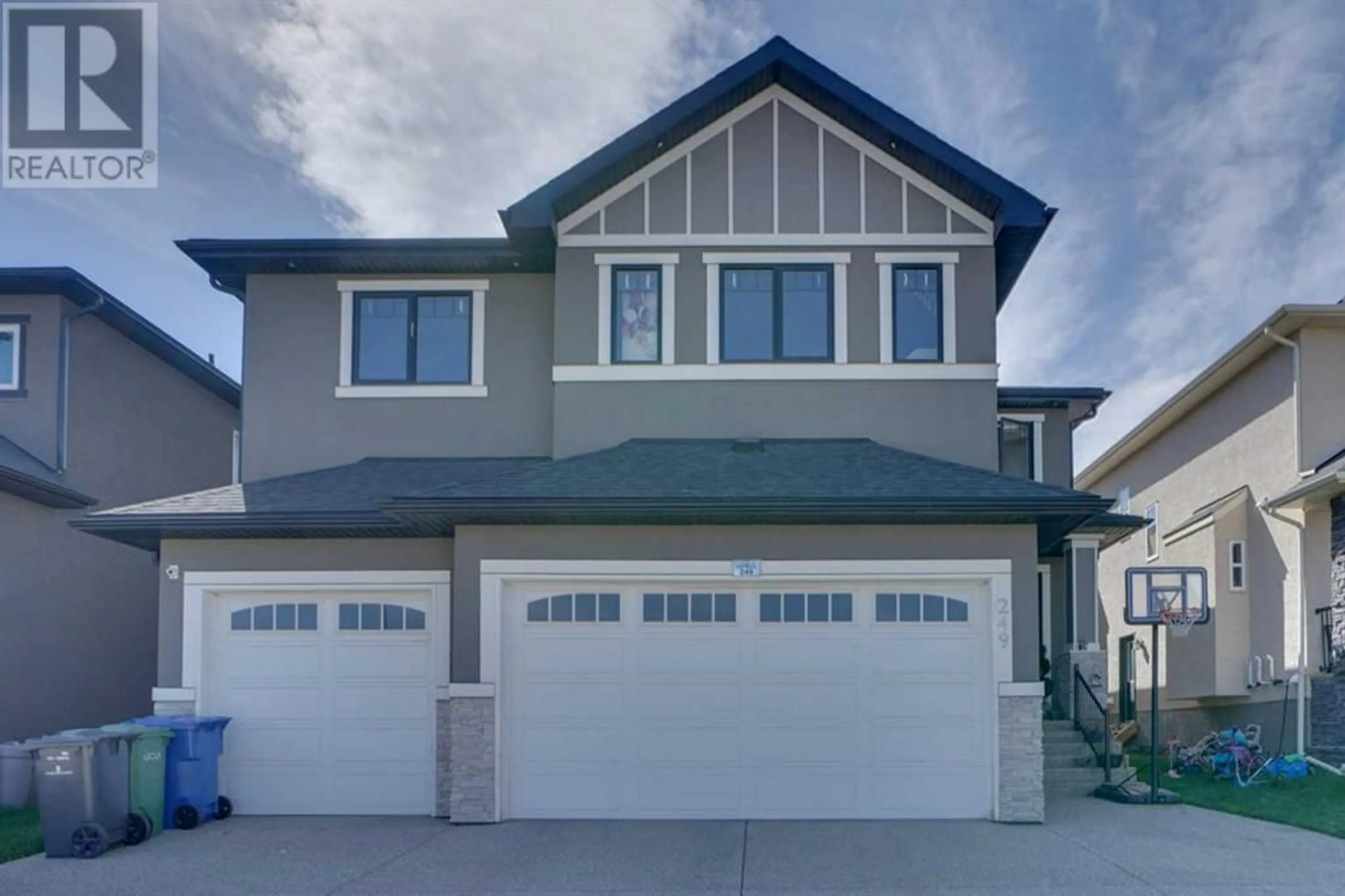 Frontside or backside of a home for 249 Kinniburgh Boulevard, Chestermere Alberta T1X0M2