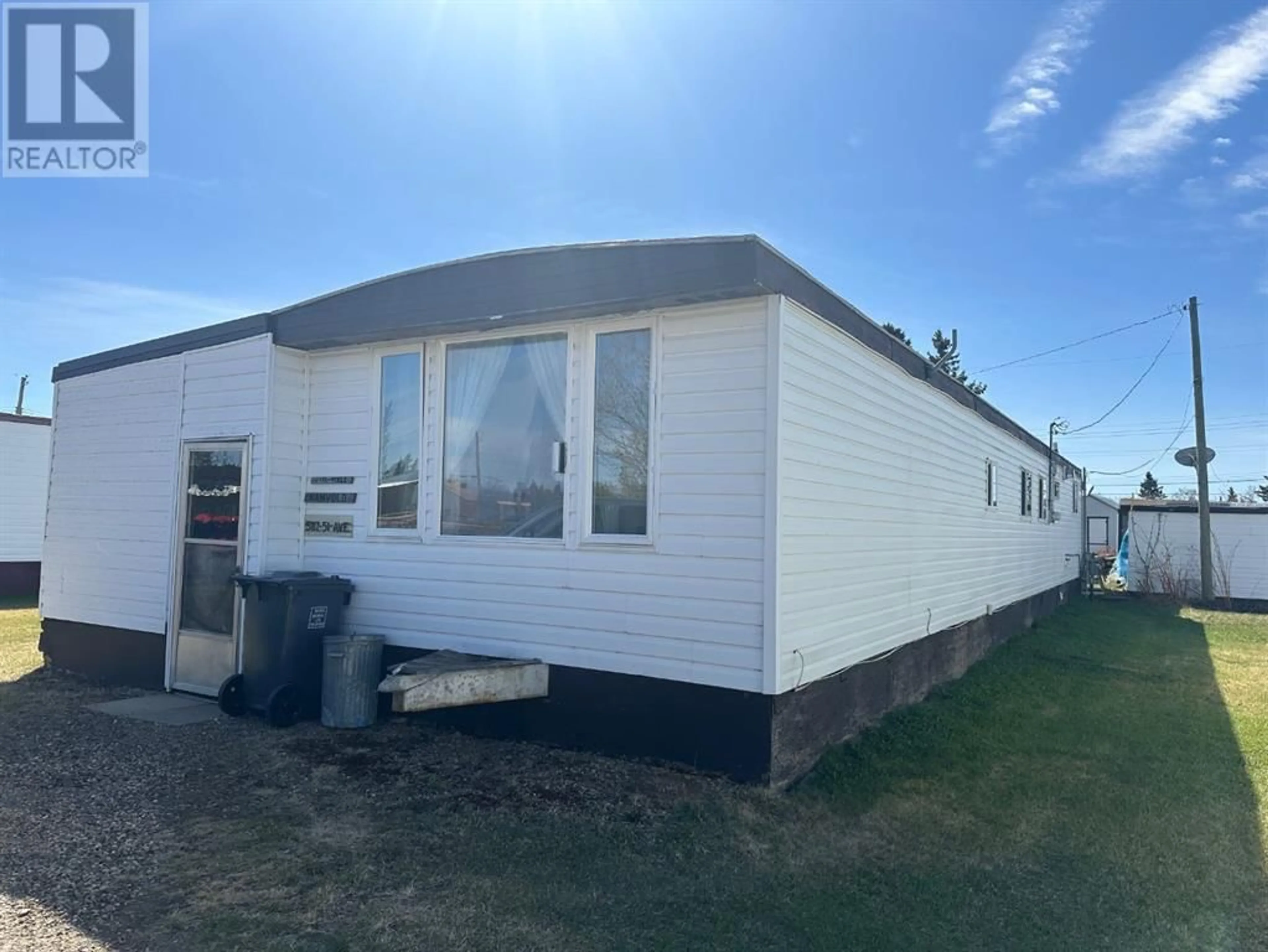 Home with vinyl exterior material for 5117 51 Avenue, Berwyn Alberta T0H0E0