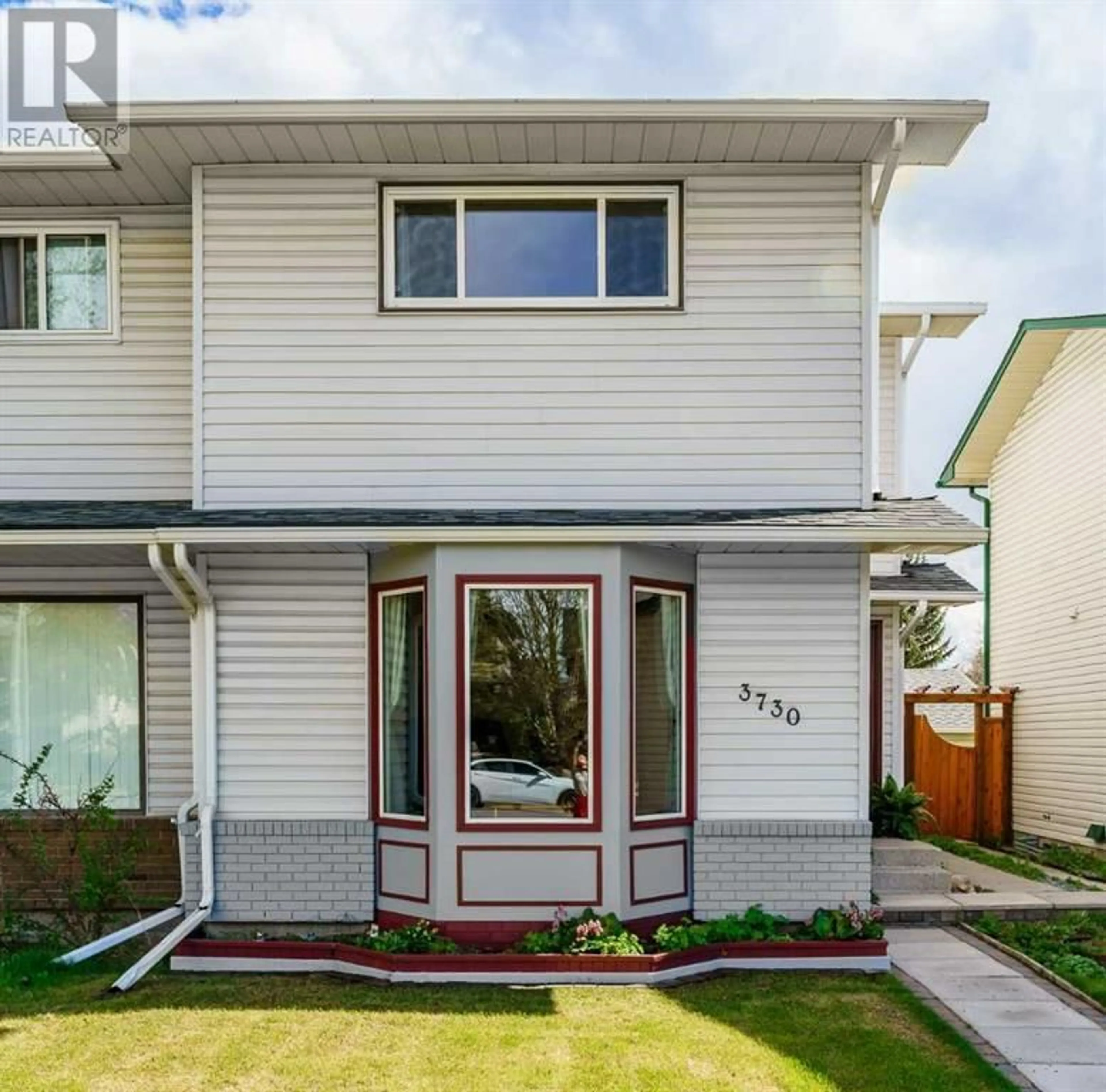 Home with vinyl exterior material for 3730 Cedarille Drive SW, Calgary Alberta T2W3Z8