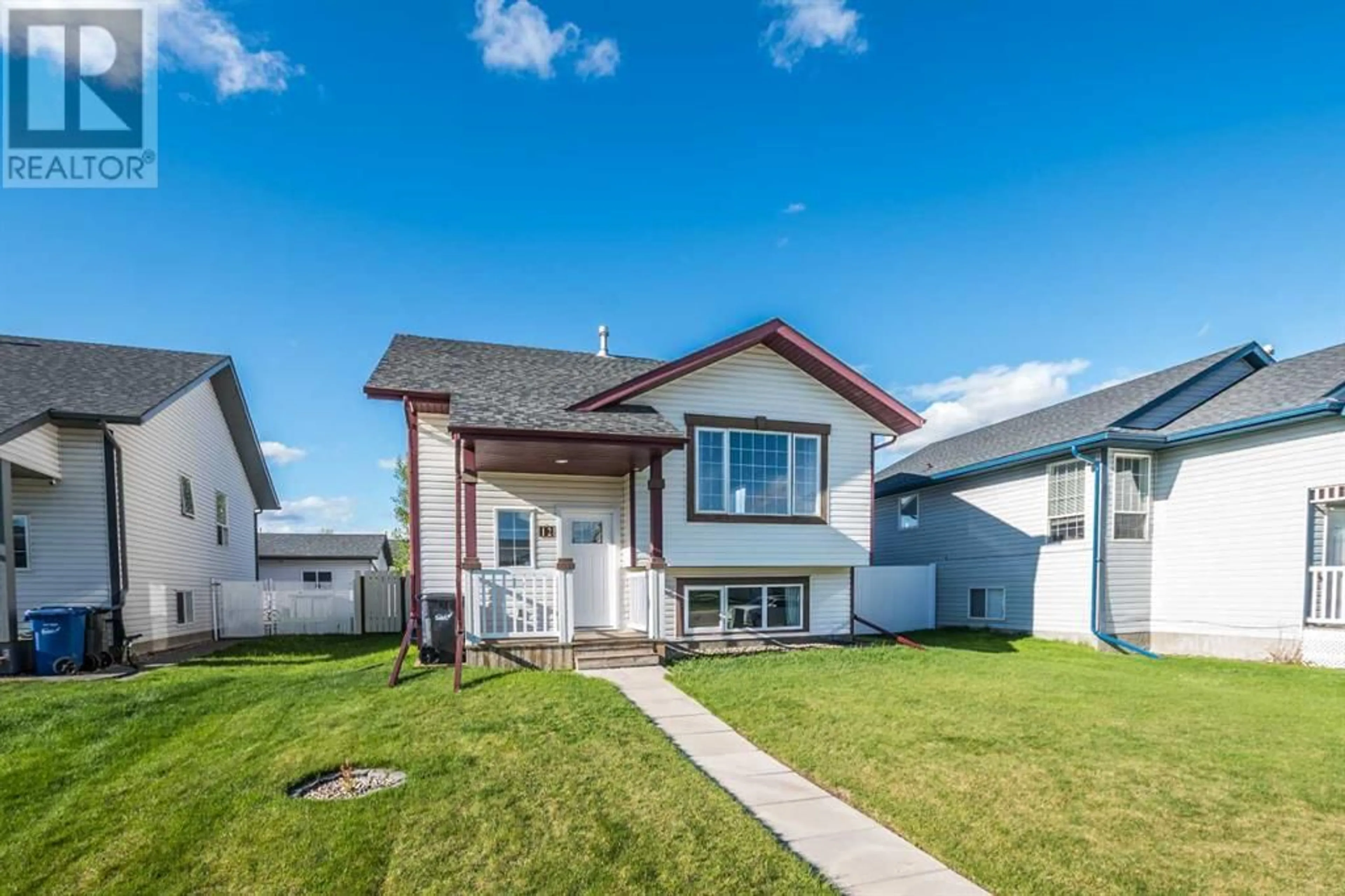 Frontside or backside of a home for 12 Johnson Close, Penhold Alberta T0M1R0