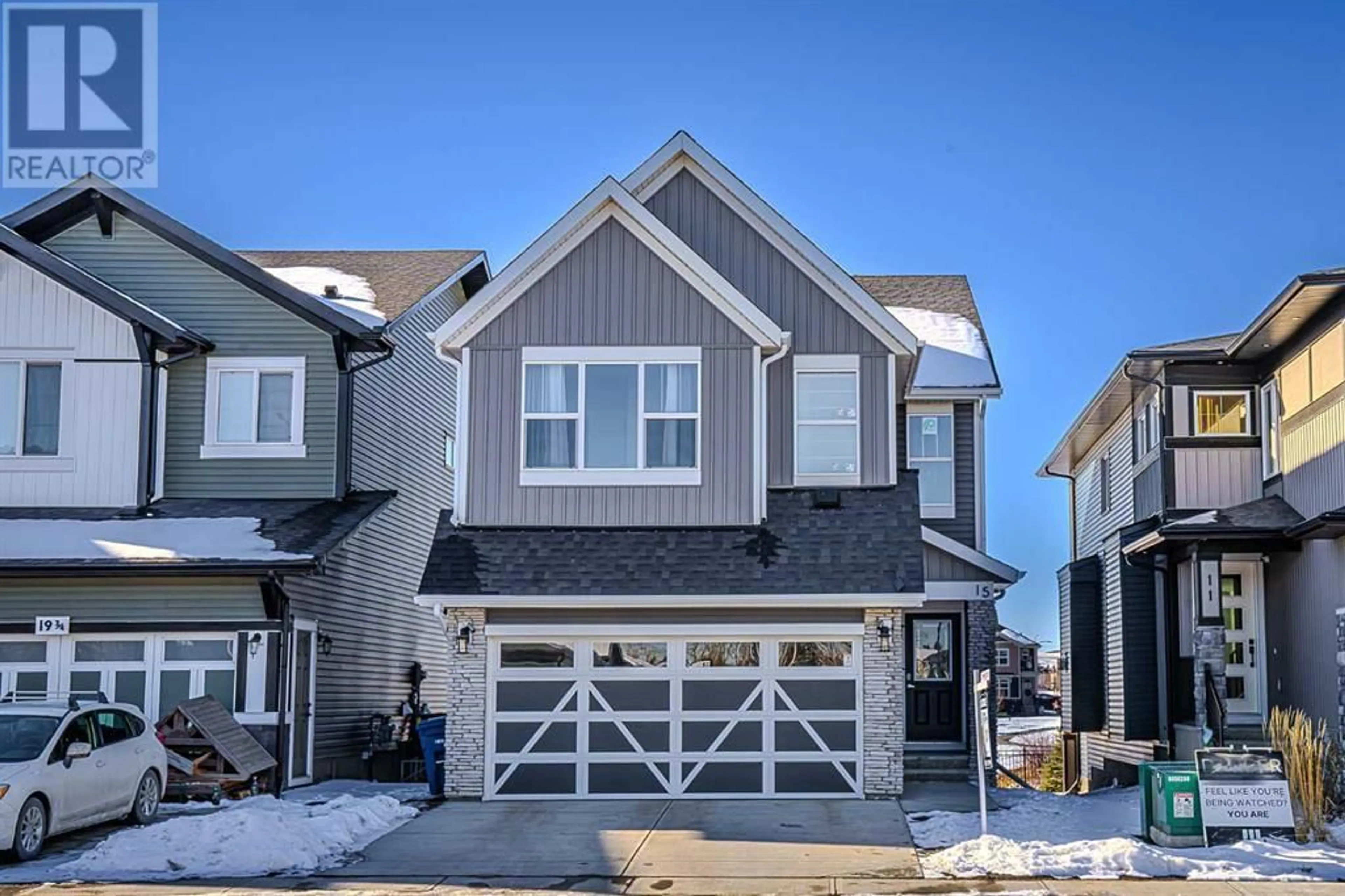 Frontside or backside of a home for 15 Midgrove Drive SW, Airdrie Alberta T4B5H1