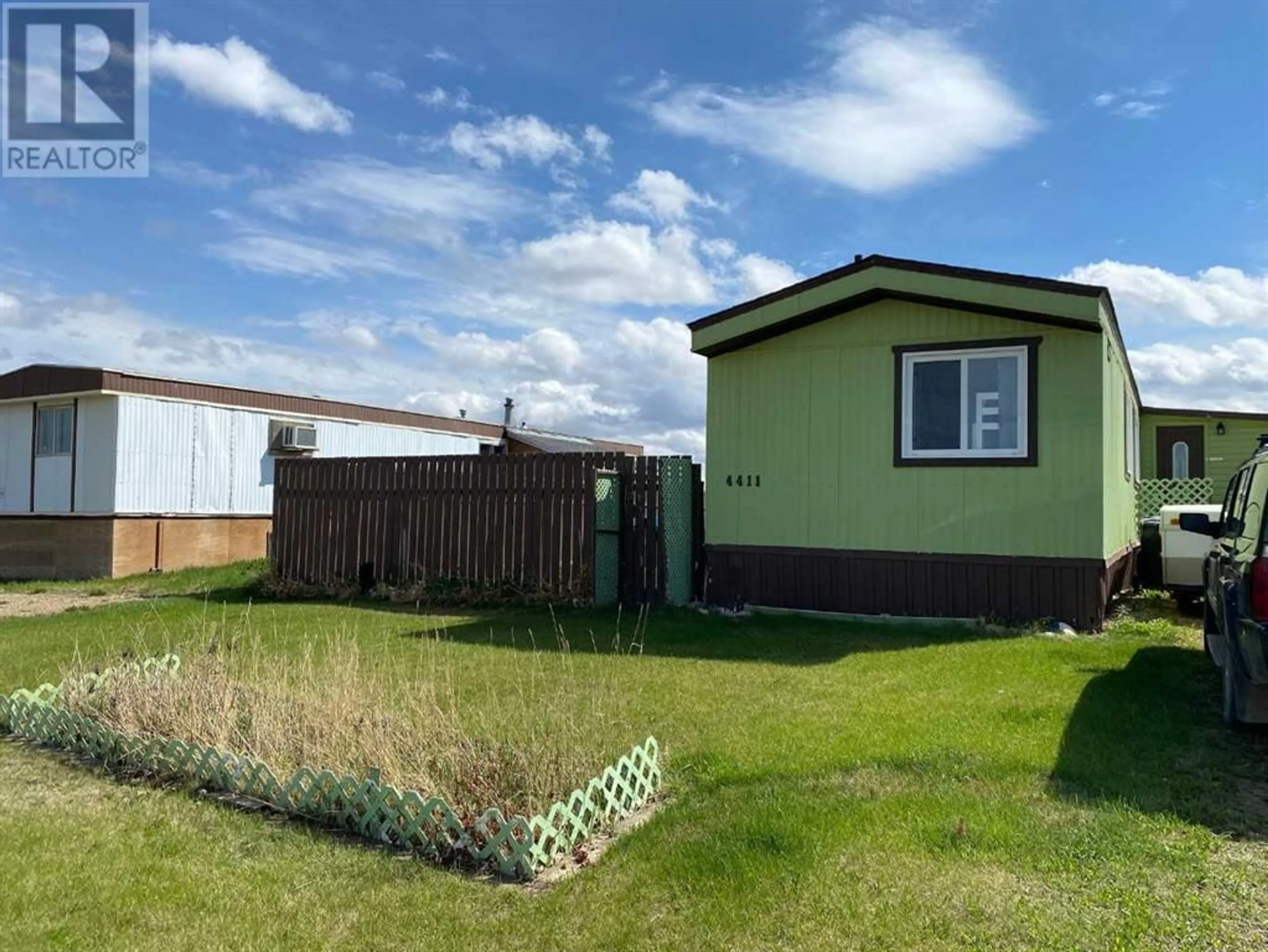 Frontside or backside of a home for 4411 46A Avenue, Rycroft Alberta T0H3A0