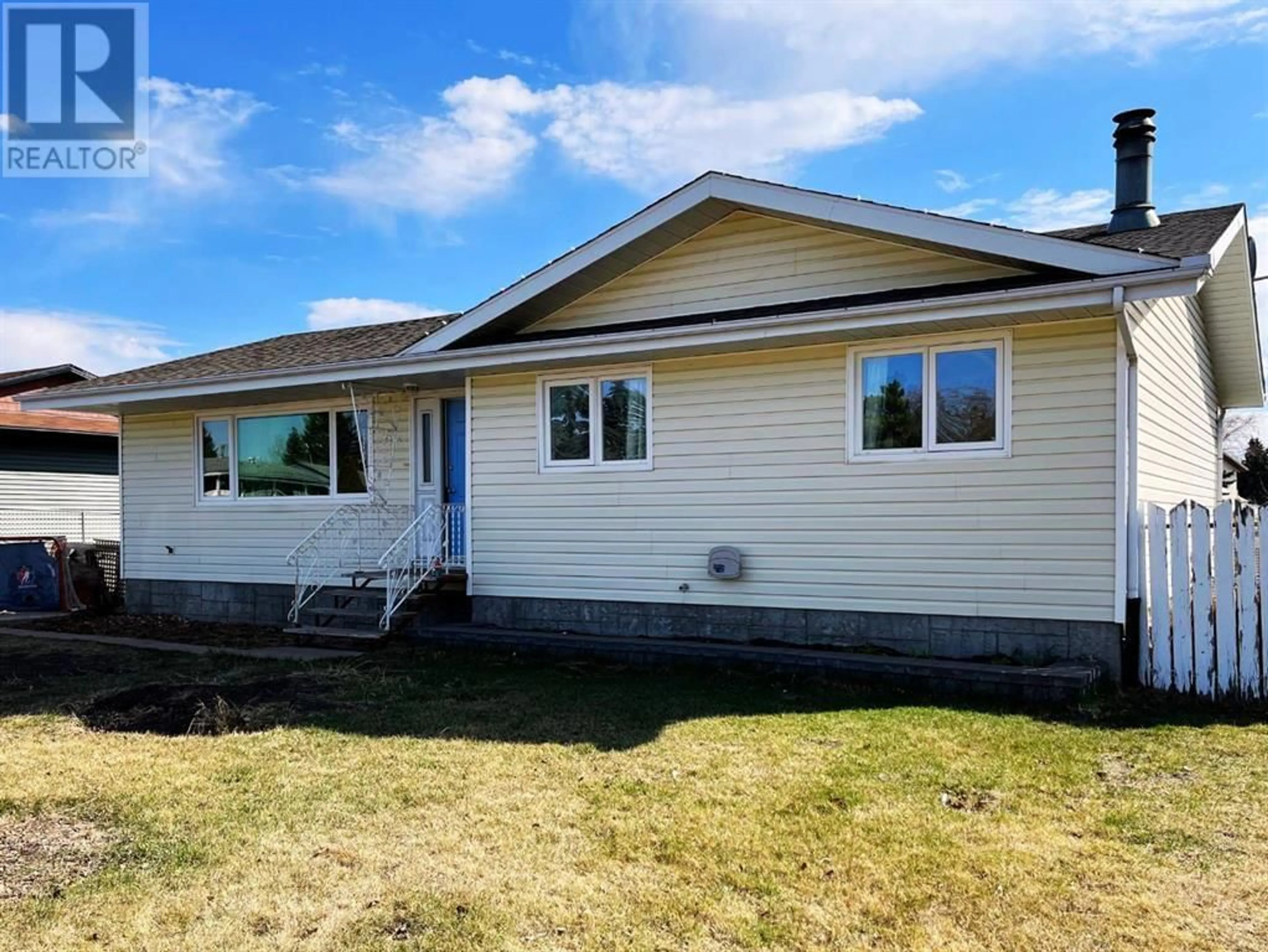 Frontside or backside of a home for 406 3 Avenue, Wainwright Alberta T9W1A1