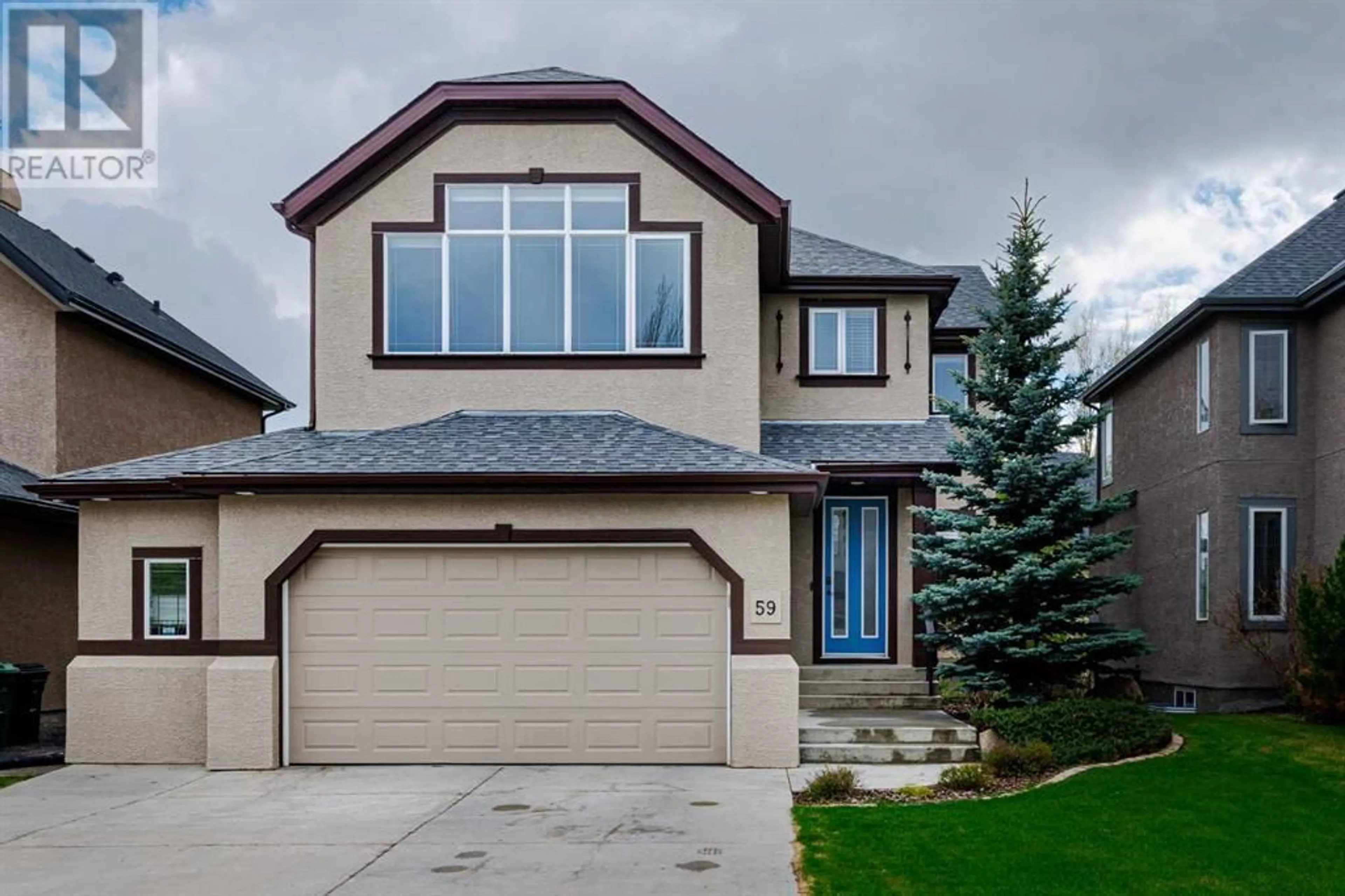 Frontside or backside of a home for 59 Tuscany Glen Place NW, Calgary Alberta T3L2Z4