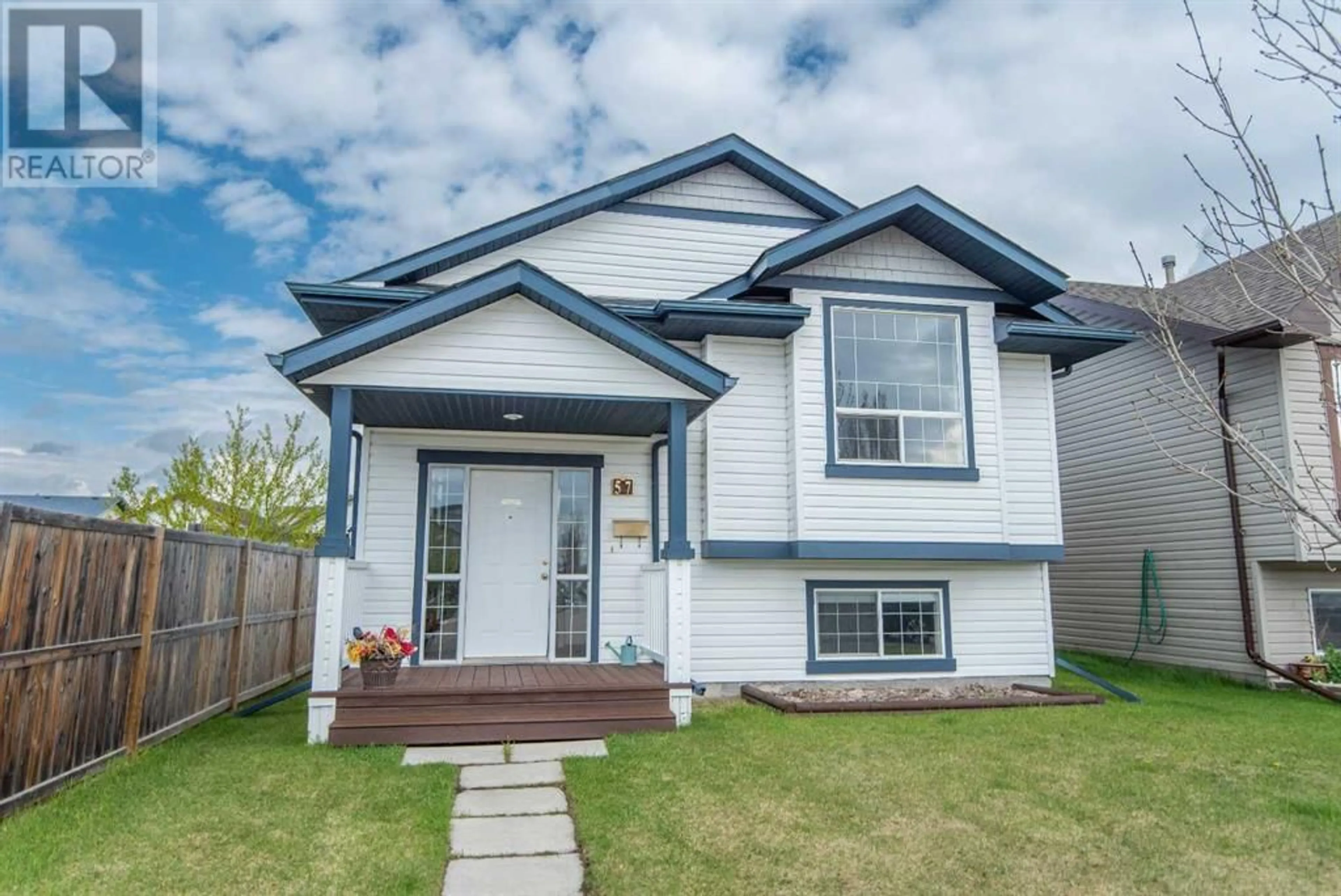 Frontside or backside of a home for 57 Leonard Crescent, Red Deer Alberta T4R3B5
