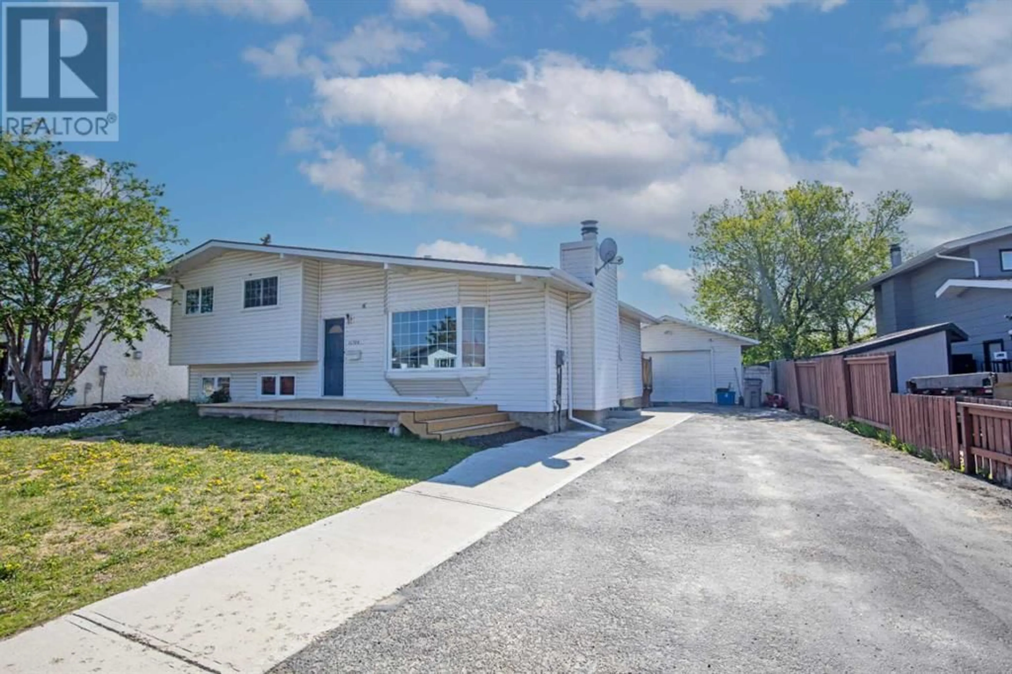 Frontside or backside of a home for 11709 94A Street, Grande Prairie Alberta T8V4N6