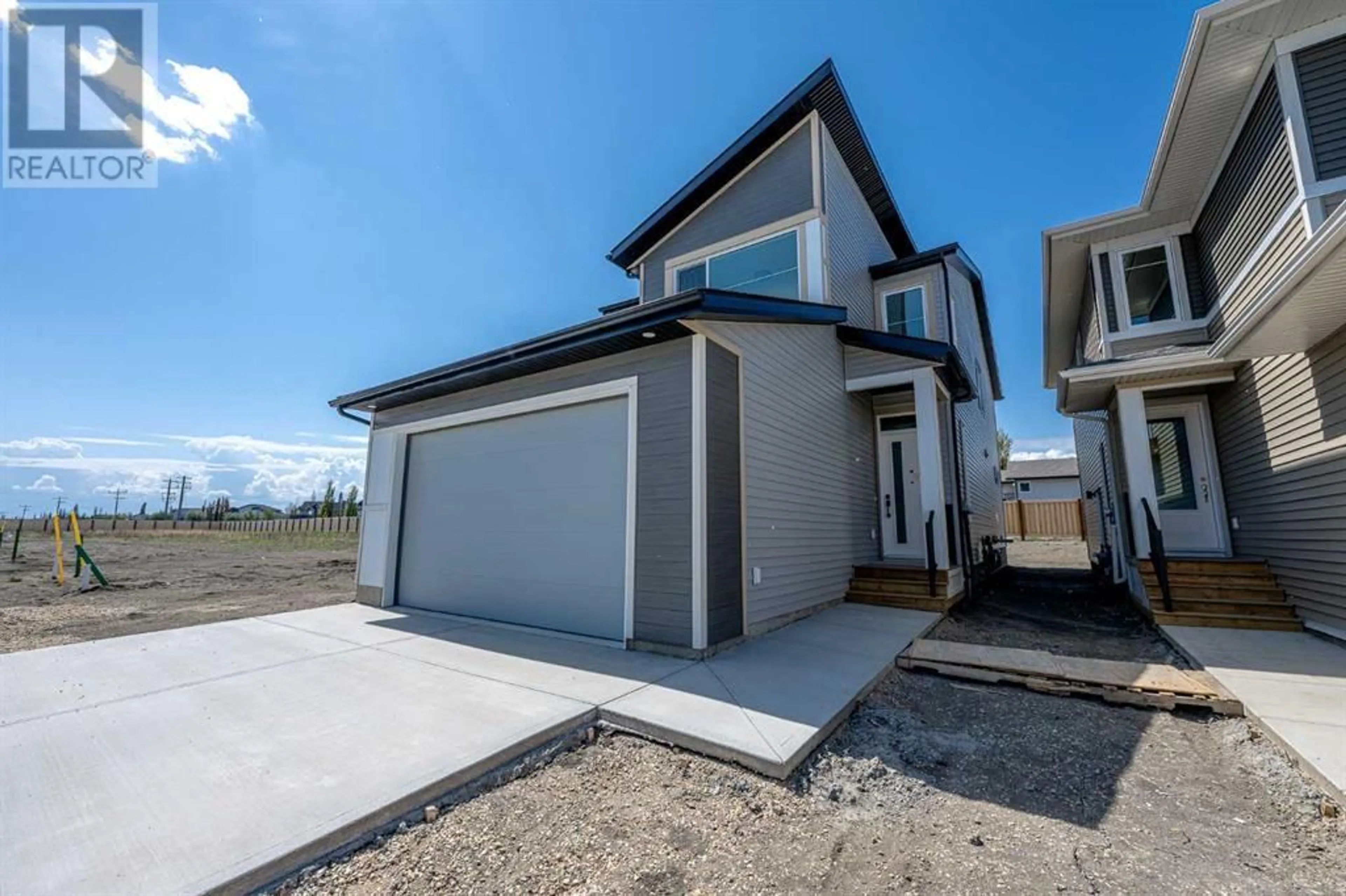 Frontside or backside of a home for 12834 87A Street, Grande Prairie Alberta T8X0H4
