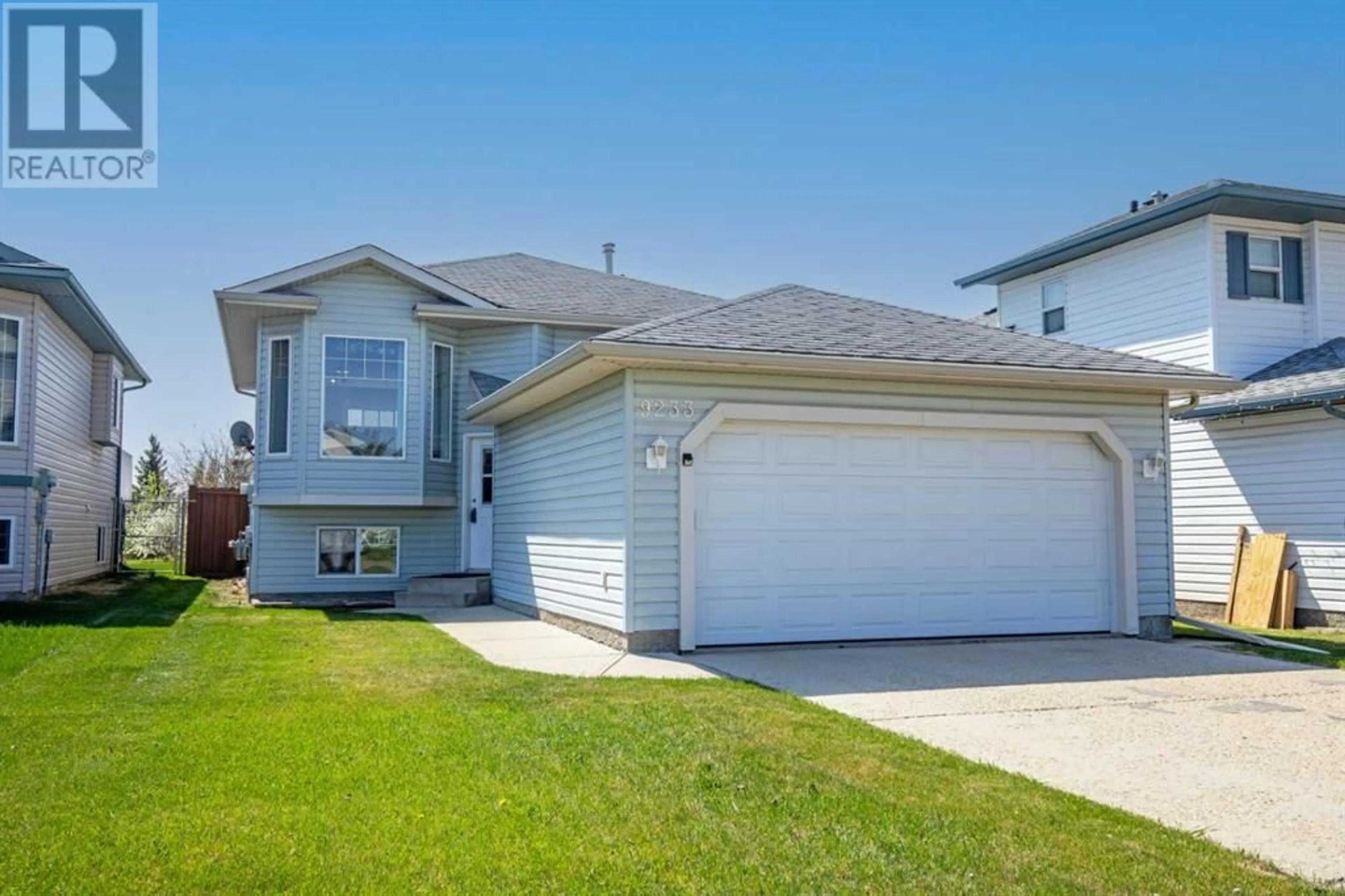Frontside or backside of a home for 9233 115 Avenue, Grande Prairie Alberta T8V7E8