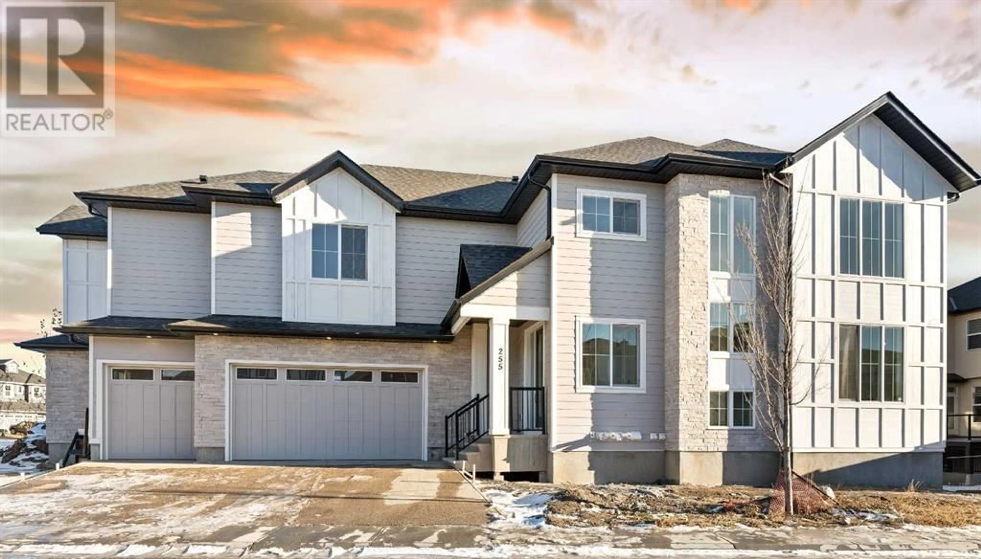 A pic from exterior of the house or condo for 255 Kinniburgh Place, Chestermere Alberta T1X1Y2