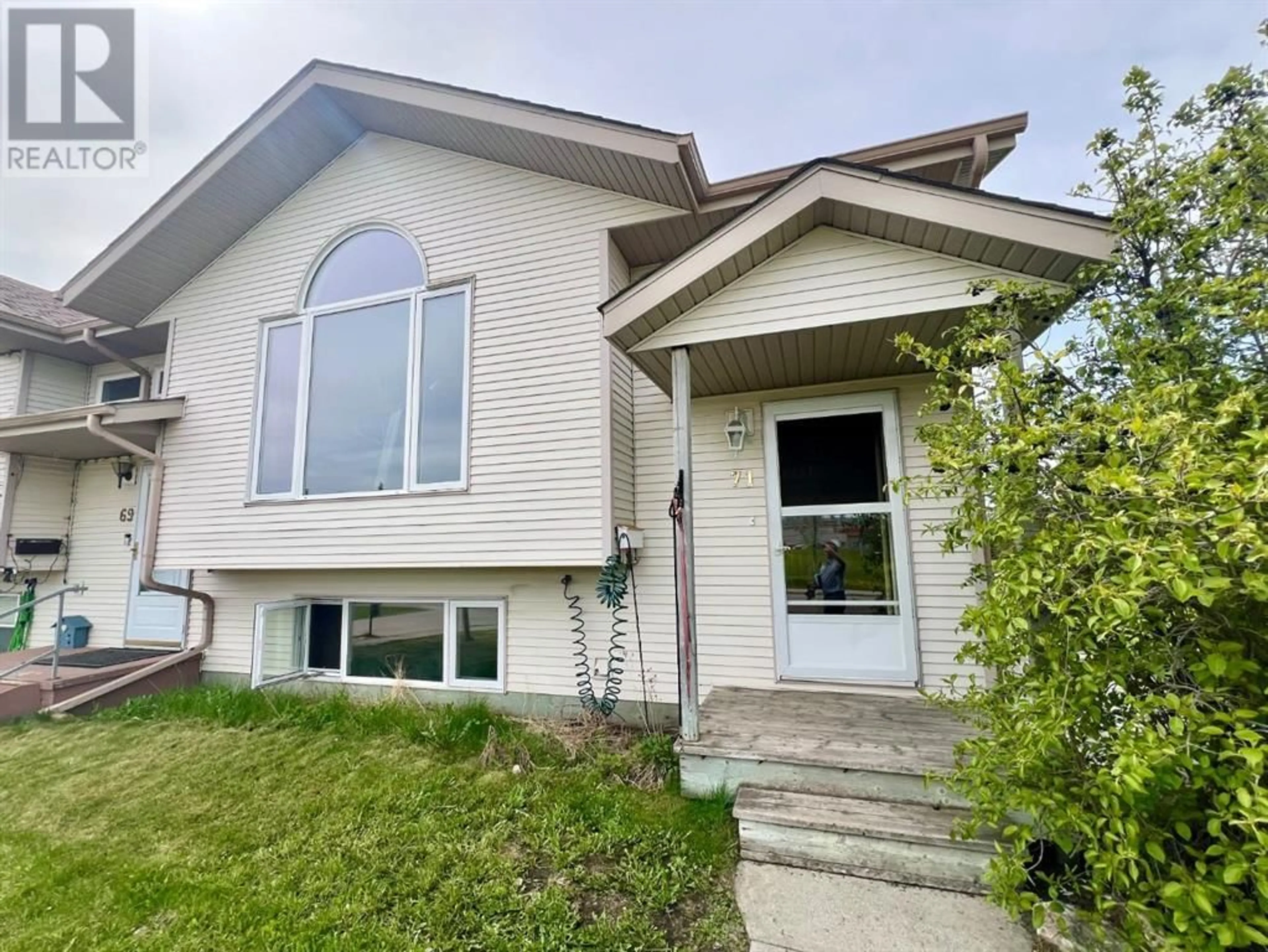 Frontside or backside of a home for 71 Lees Street, Red Deer Alberta T4R2P3