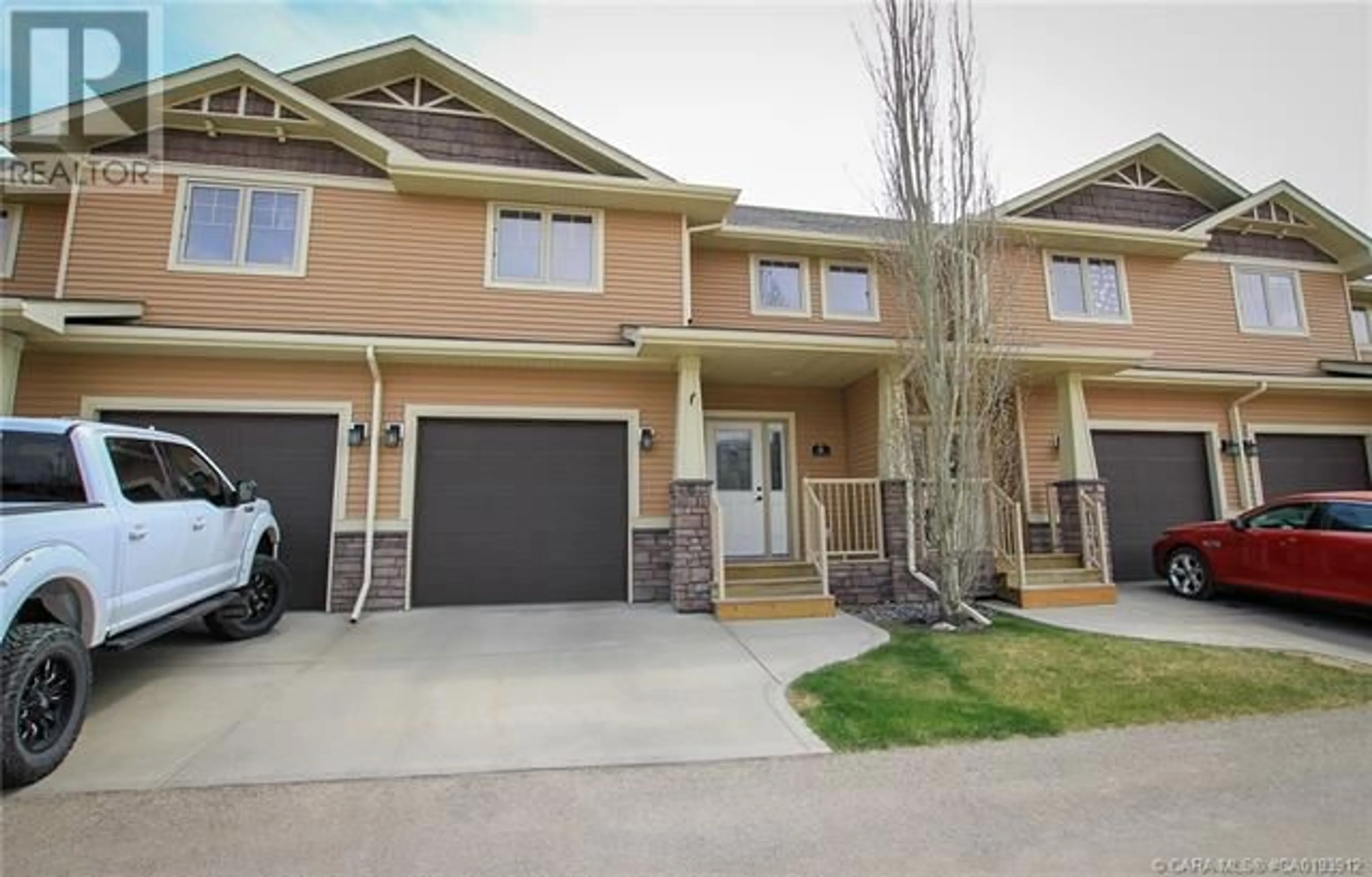 A pic from exterior of the house or condo for 11 4603 Ryders Ridge Boulevard, Sylvan Lake Alberta T4S0G6