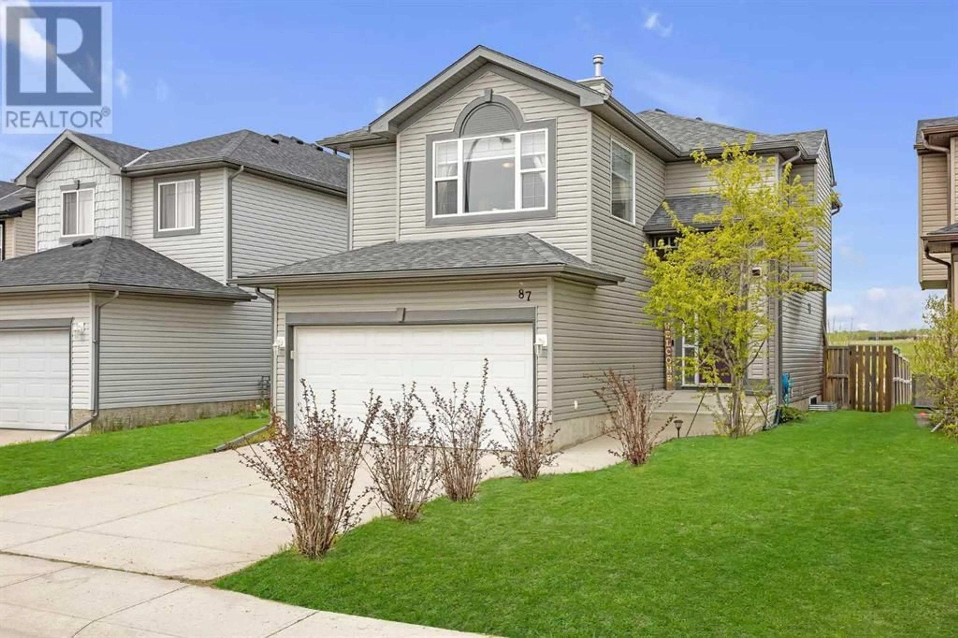 Frontside or backside of a home for 87 Bridlecrest Street SW, Calgary Alberta T2Y4Y8