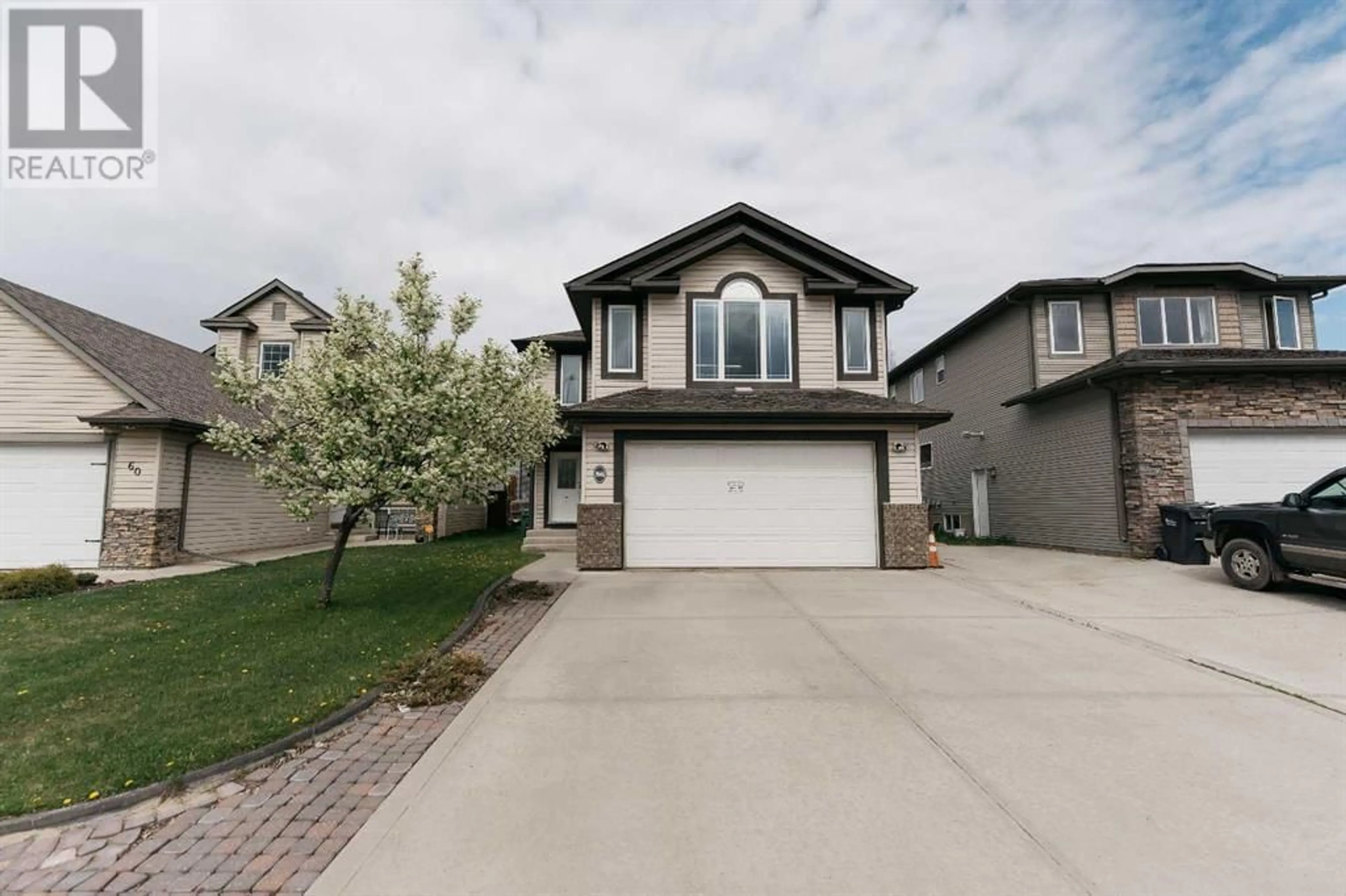 Frontside or backside of a home for 56 Oak Drive, Red Deer Alberta T4P0B8