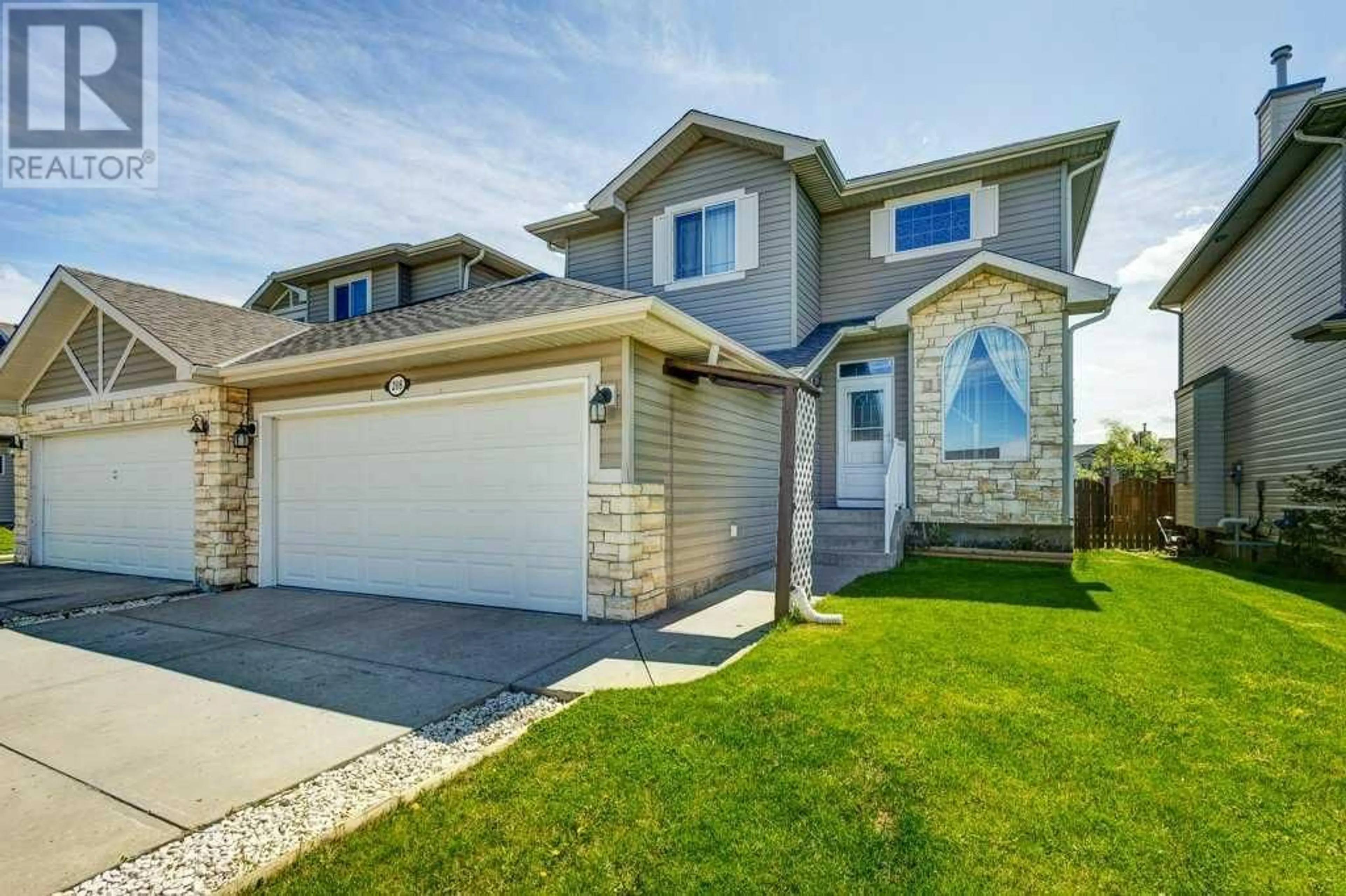Frontside or backside of a home for 208 Crimson LANE, Chestermere Alberta T1X1R7