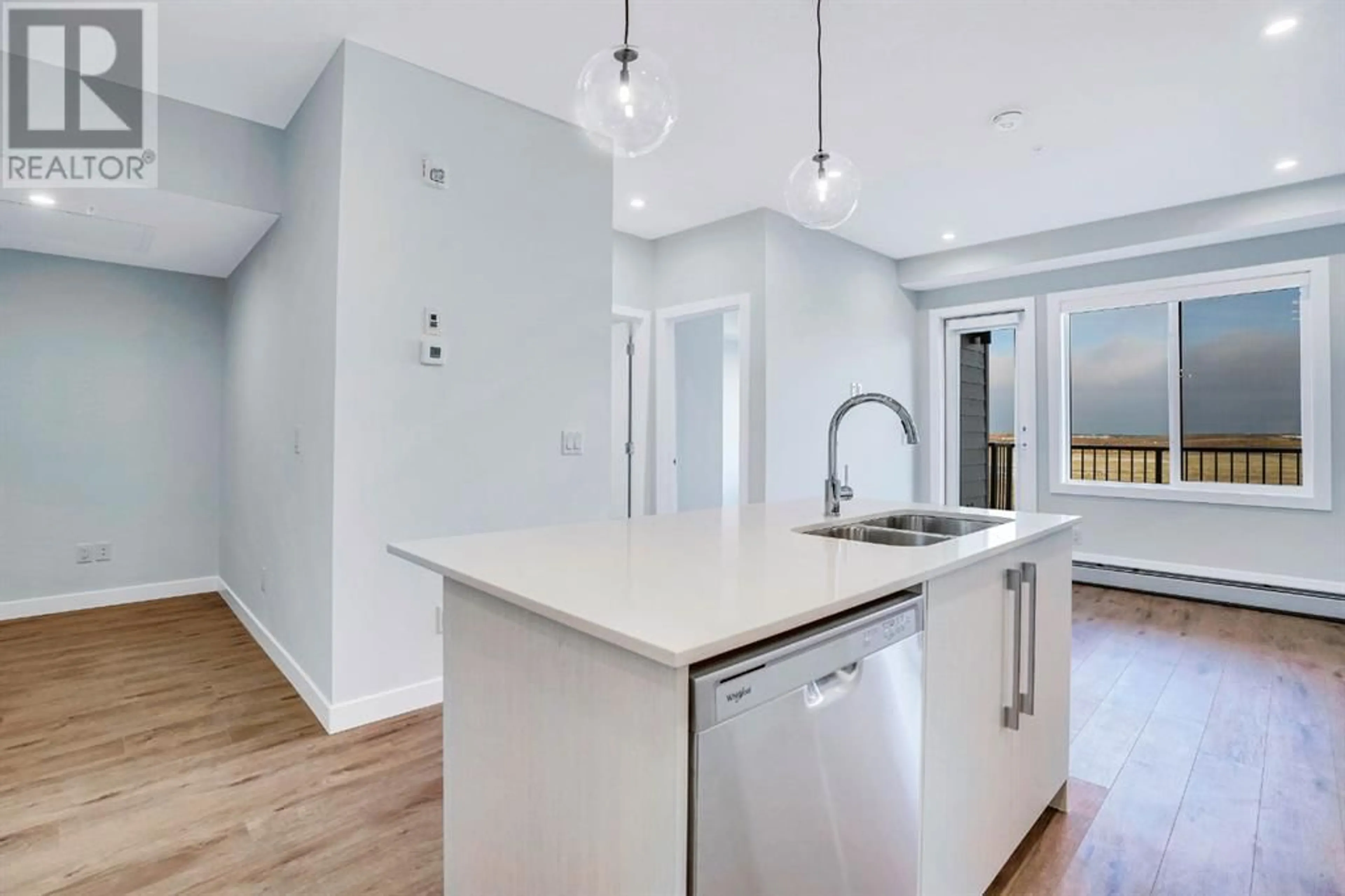 Open concept kitchen, unknown for 1306 395 Skyview Parkway NE, Calgary Alberta T3N2K1