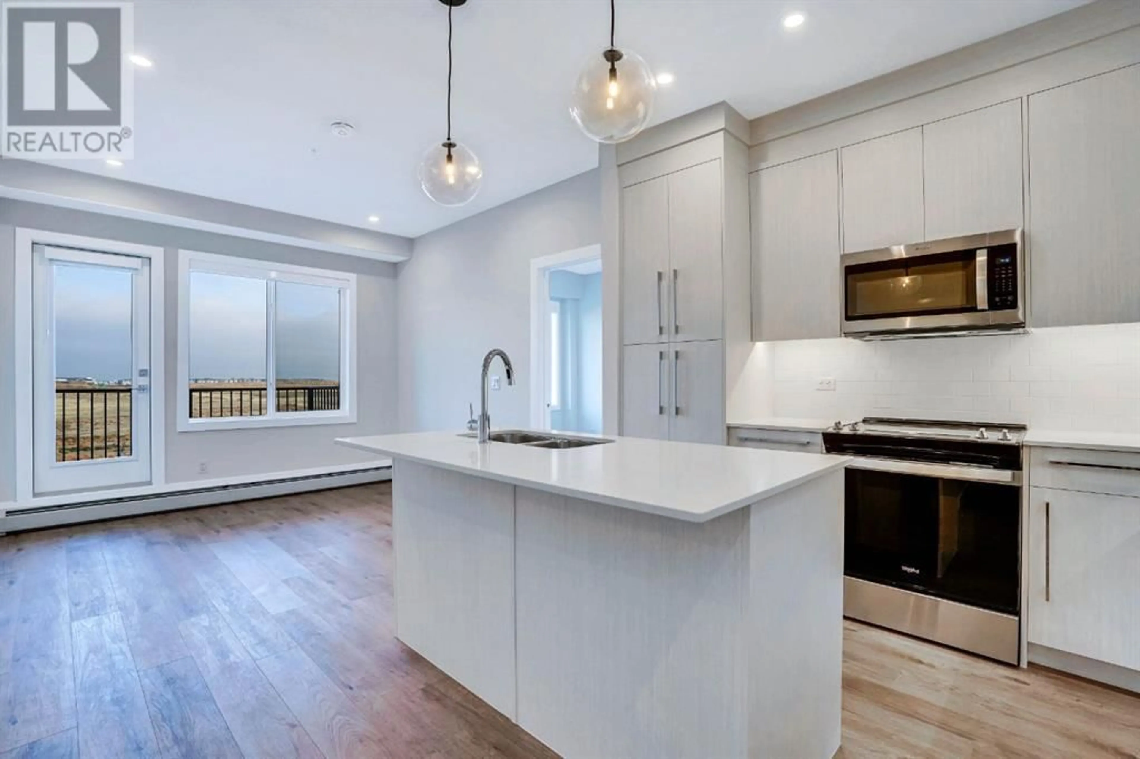 Open concept kitchen, unknown for 1306 395 Skyview Parkway NE, Calgary Alberta T3N2K1