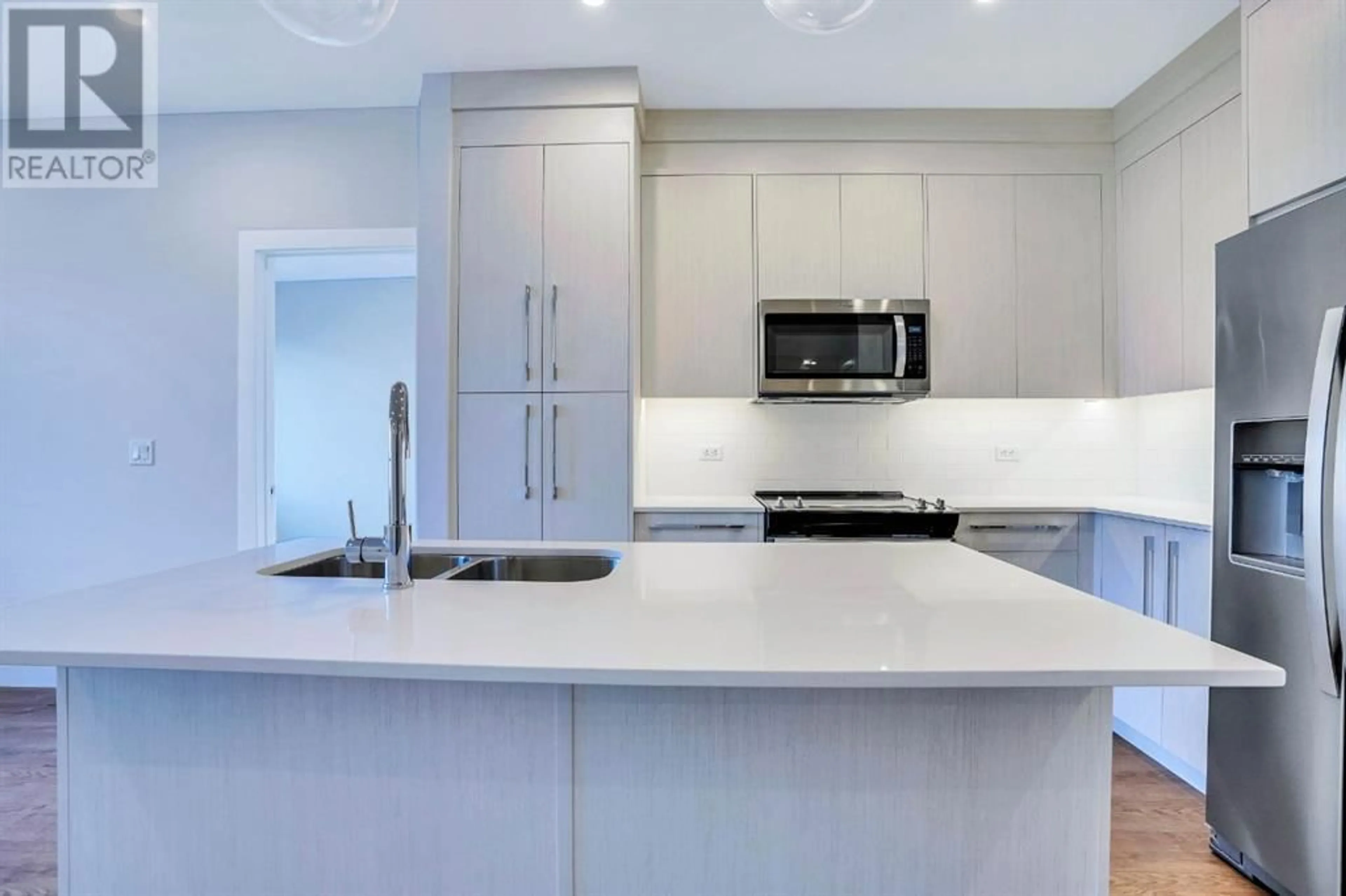 Open concept kitchen, unknown for 1306 395 Skyview Parkway NE, Calgary Alberta T3N2K1