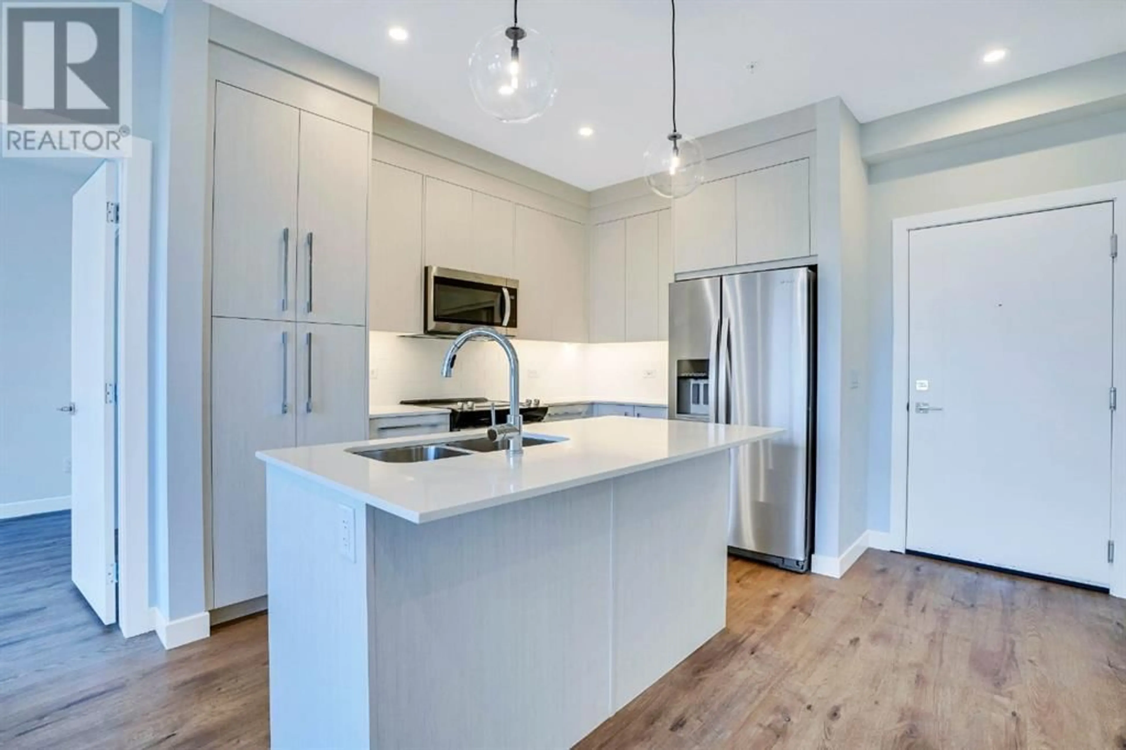 Open concept kitchen, unknown for 1306 395 Skyview Parkway NE, Calgary Alberta T3N2K1