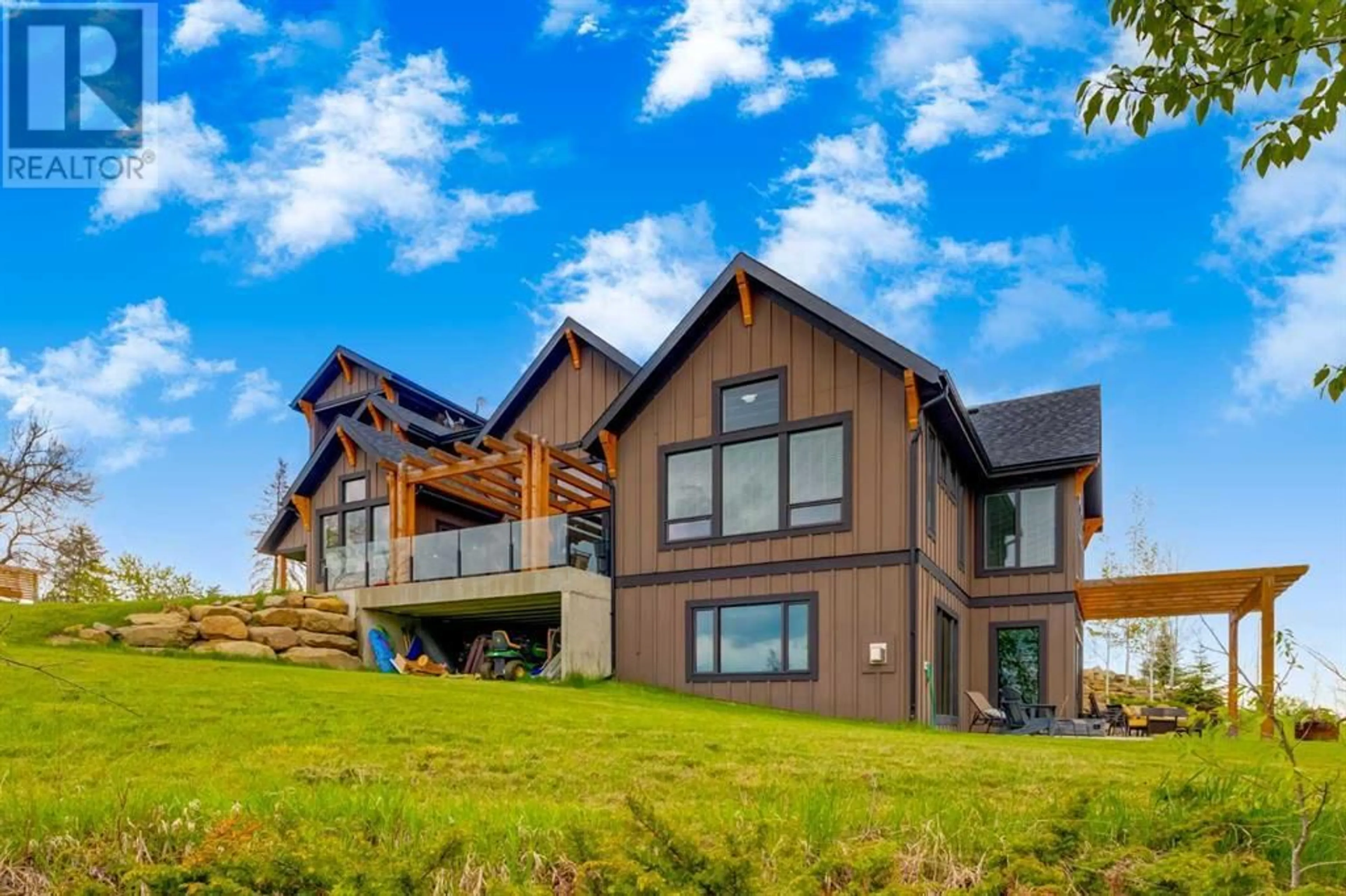 Home with vinyl exterior material, mountain view for 232025 48 STREET EAST, Rural Foothills County Alberta T1S3R4