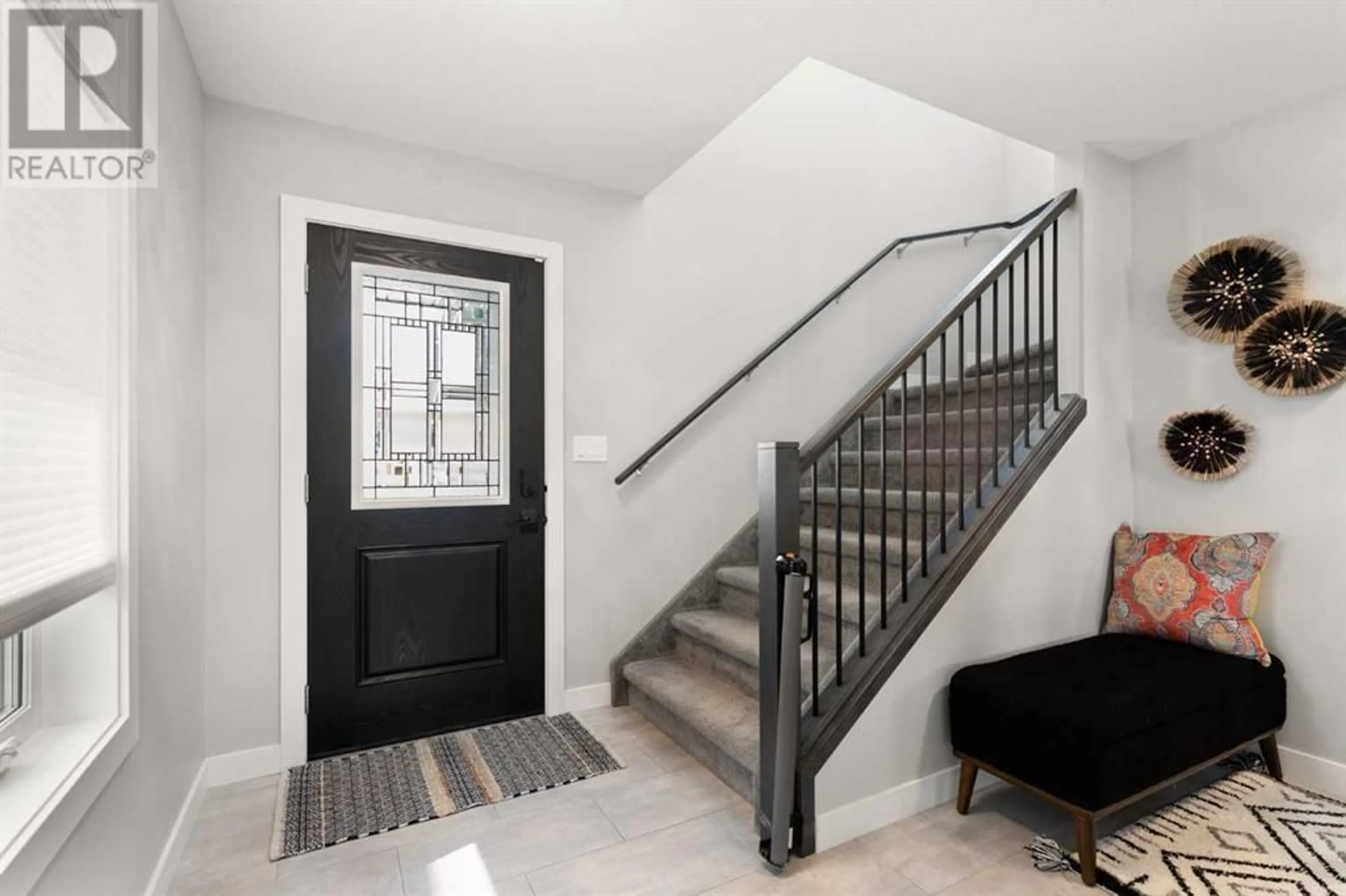 Indoor entryway for 104 HAMPTONS CRESCENT SOUTHEAST, Medicine Hat Alberta T1B0P5