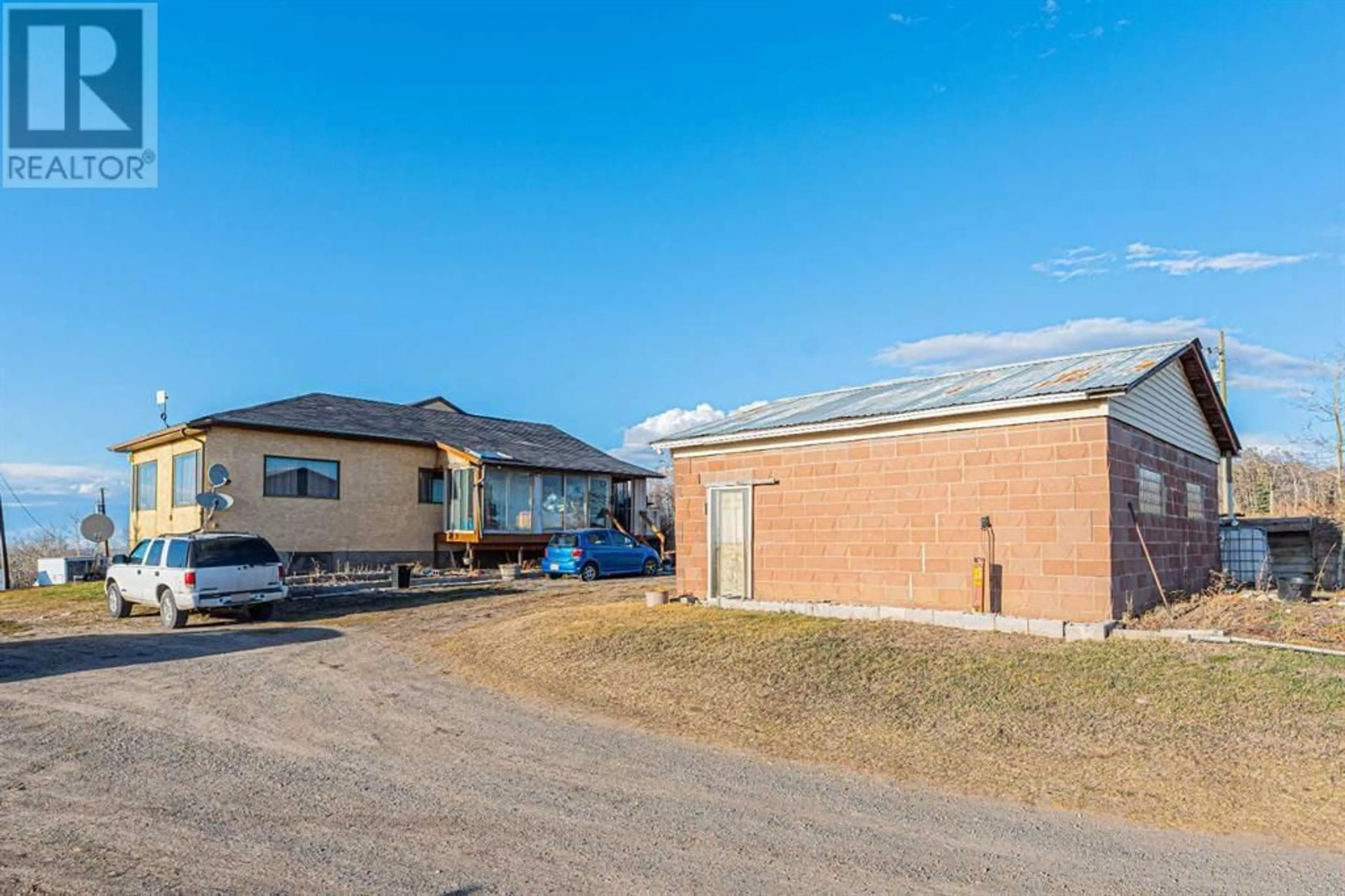 A pic from outside/outdoor area/front of a property/back of a property/a pic from drone, building for 266110 1014 DRIVE EAST, Rural Foothills County Alberta T1S4S5