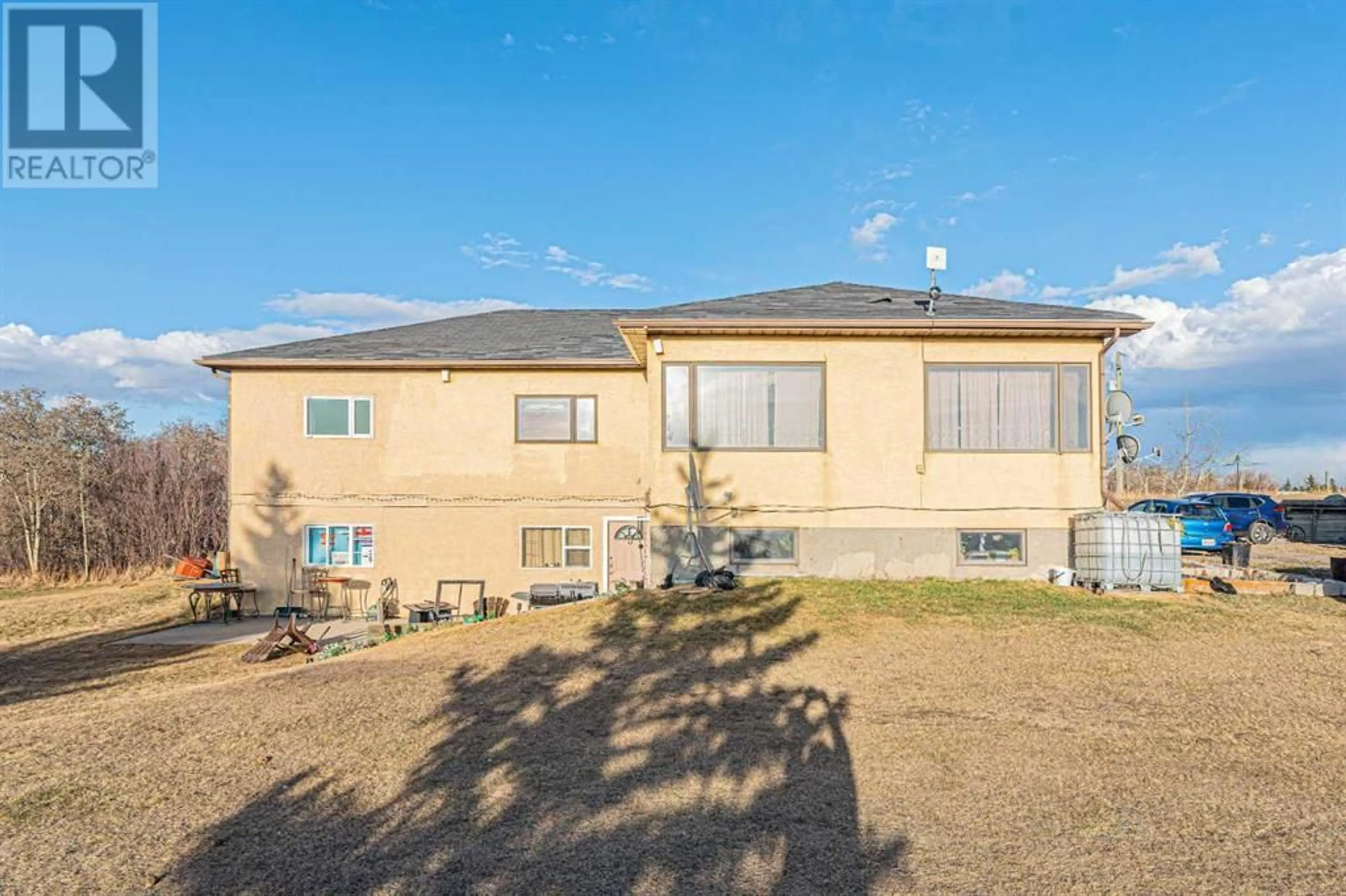 A pic from outside/outdoor area/front of a property/back of a property/a pic from drone, unknown for 266110 1014 DRIVE EAST, Rural Foothills County Alberta T1S4S5