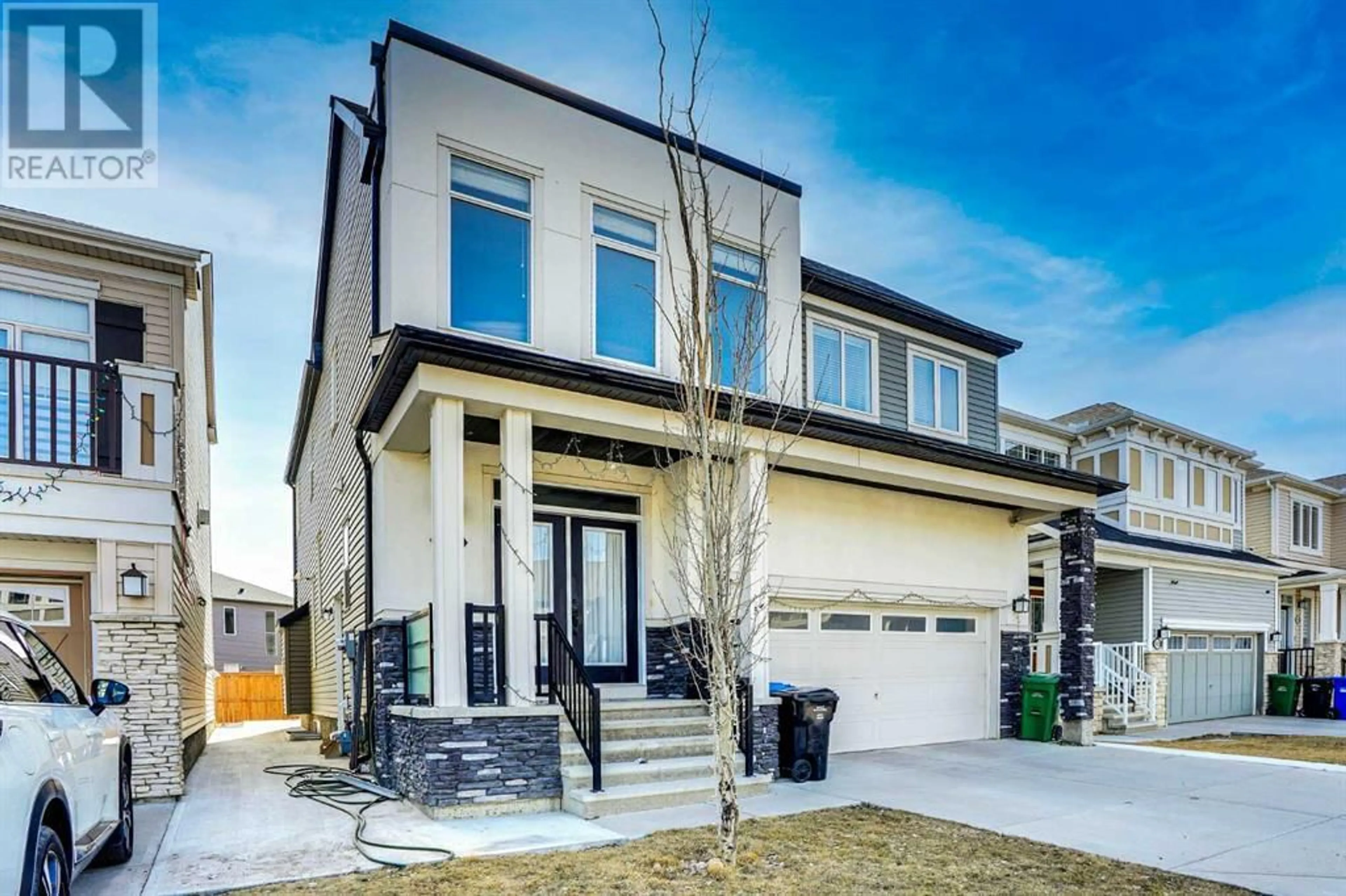 Home with brick exterior material, street for 76 CITYSCAPE GROVE NORTHEAST, Calgary Alberta T3N0M7
