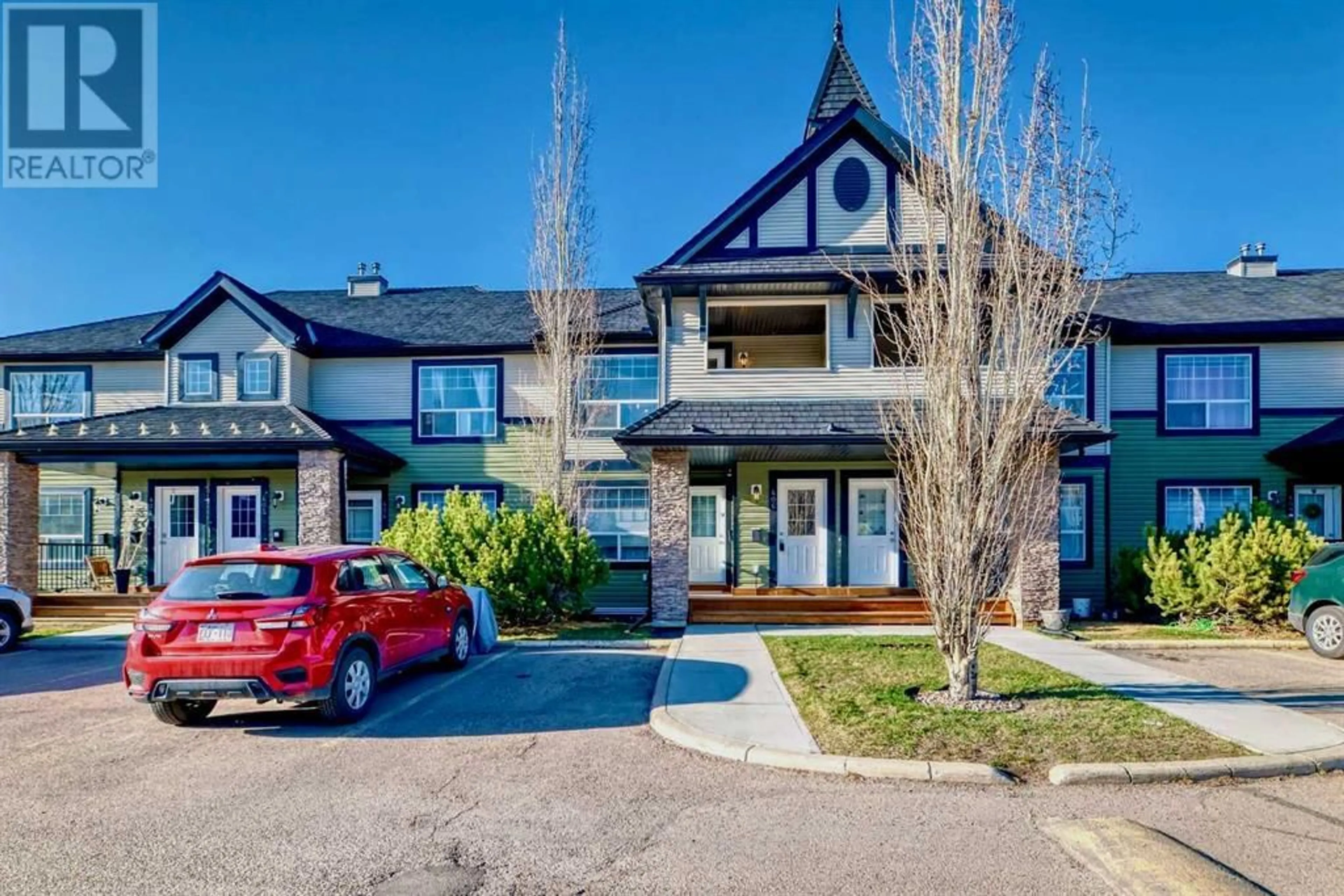 A pic from outside/outdoor area/front of a property/back of a property/a pic from drone, street for 140 SAGEWOOD BOULEVARD SOUTHWEST, Airdrie Alberta T4B3H5