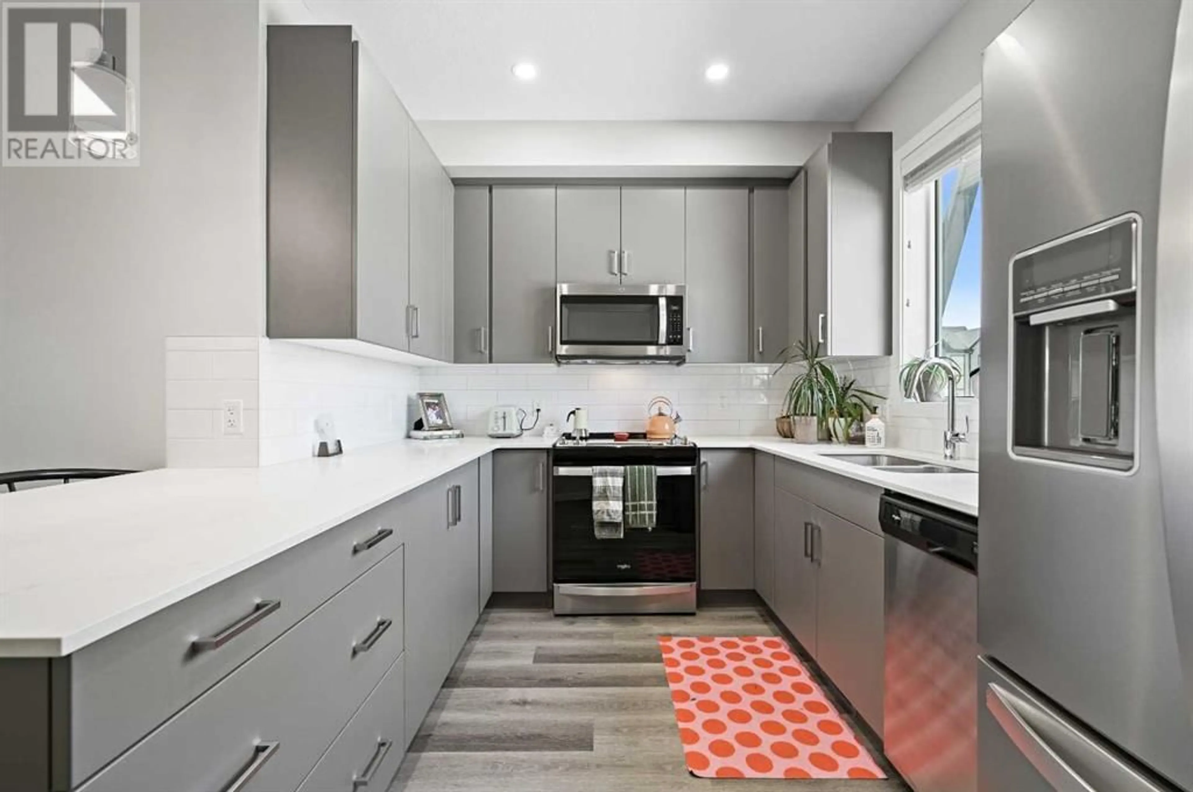Contemporary kitchen, ceramic/tile floor for 376 210 AVENUE SOUTHWEST, Calgary Alberta T2X4A5