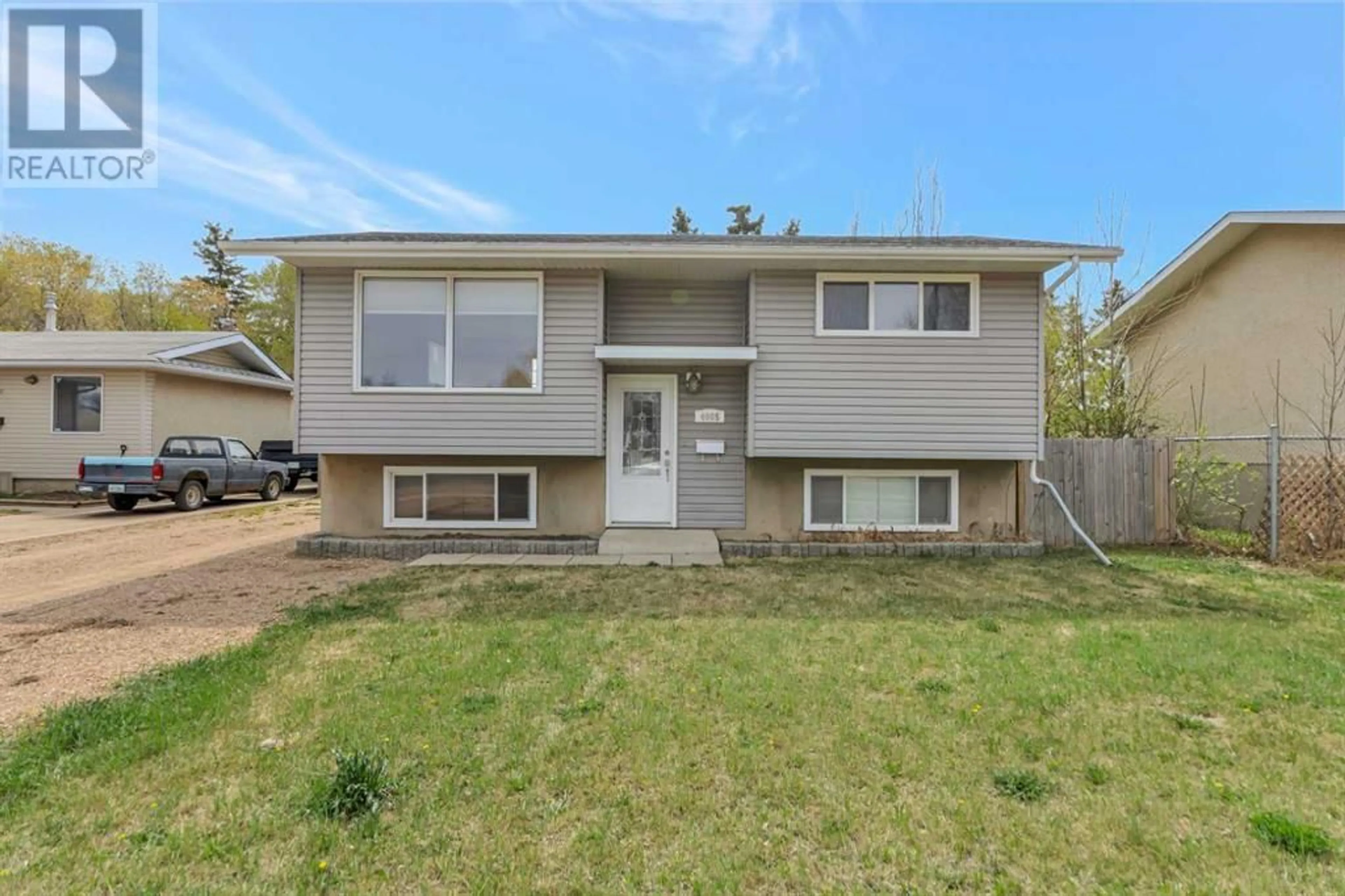 Home with vinyl exterior material, street for 4805 36 STREET, Lloydminster Alberta S9V0A1