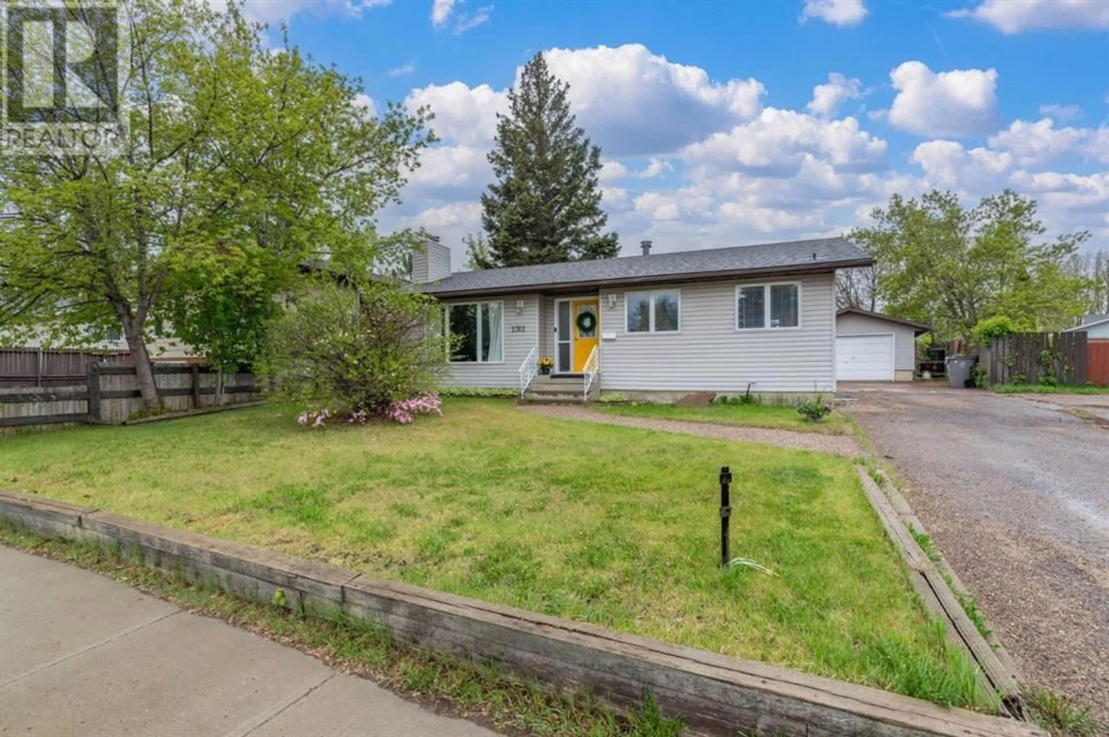 Home with vinyl exterior material, street for 2312 47 AVENUE, Lloydminster Alberta S9V1L3