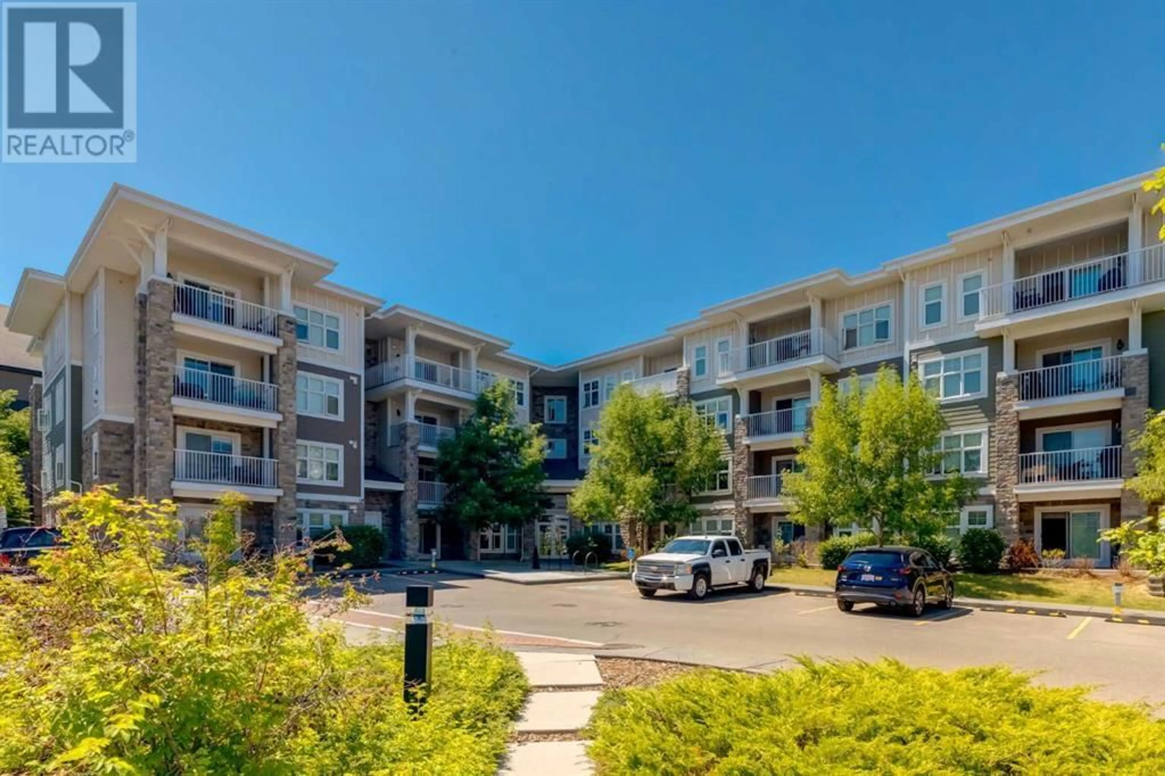 A pic from outside/outdoor area/front of a property/back of a property/a pic from drone, street for 11 MAHOGANY ROW SOUTHEAST, Calgary Alberta T3M2L6