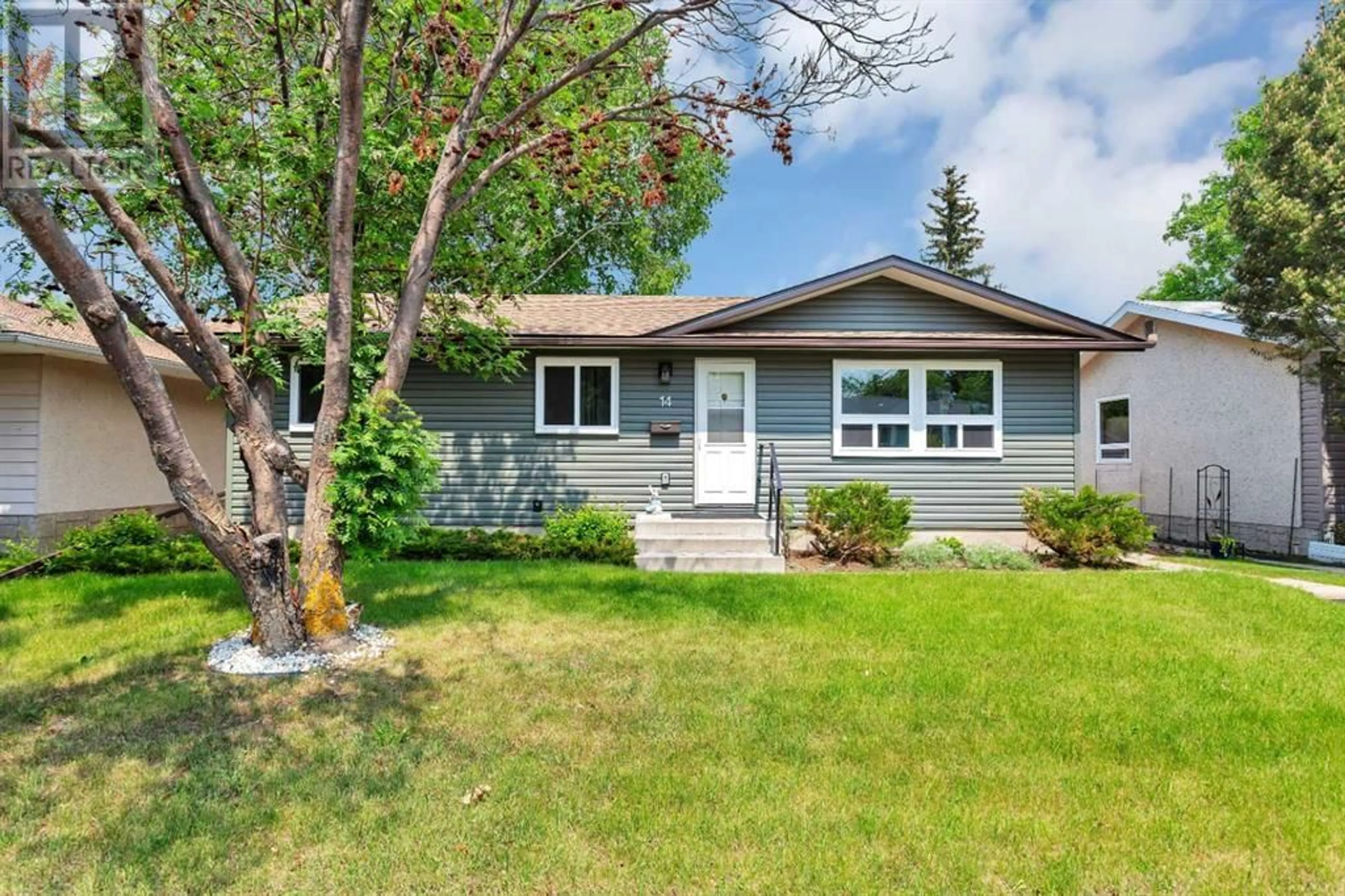 Home with vinyl exterior material, street for 14 OVINGTON CLOSE, Red Deer Alberta T4H5J3